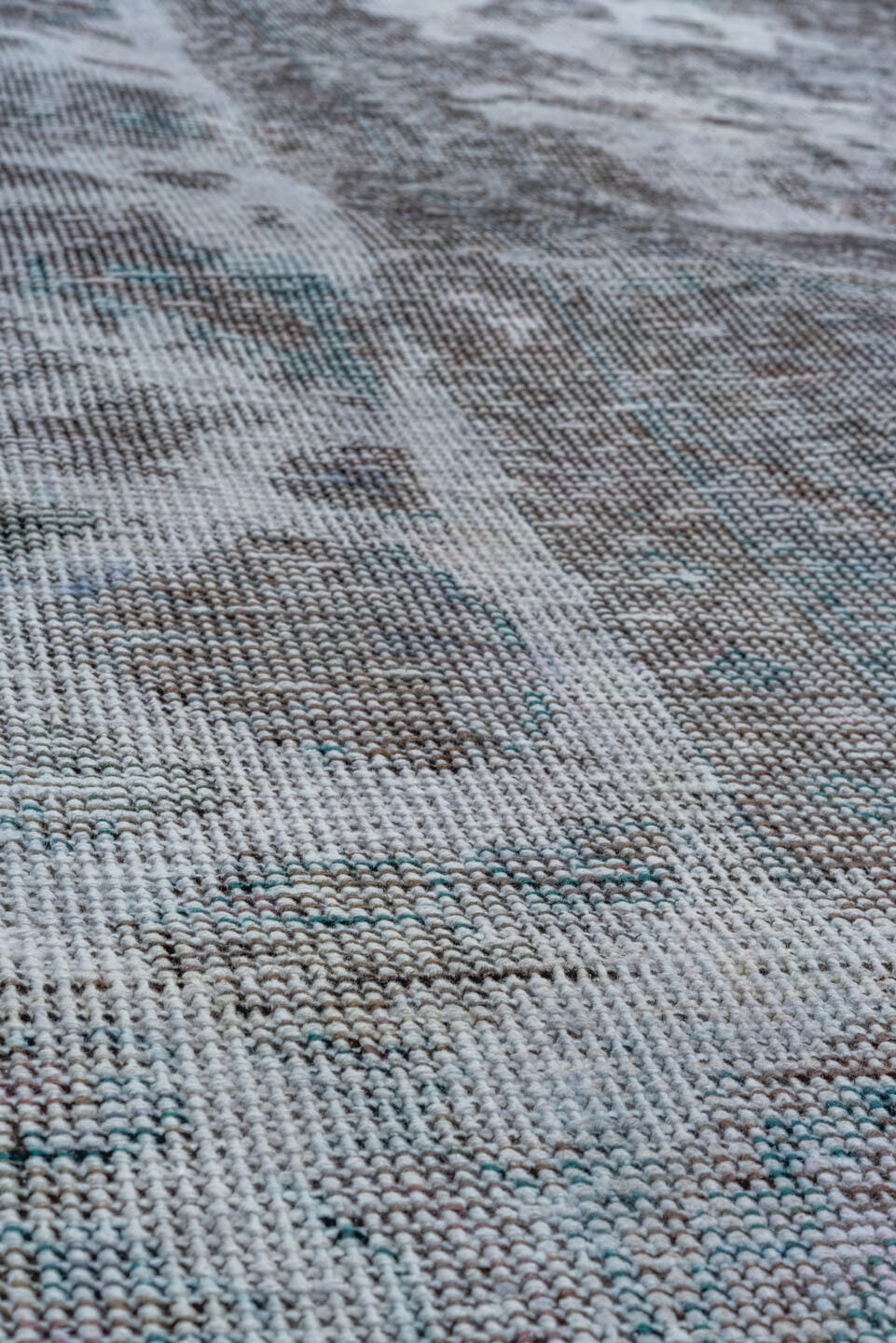 6' x 9' one-of-a-kind handmade vintage Overdyed medium size rug. Color palette: charcoal, ivory, gray, taupe, teal, lavender