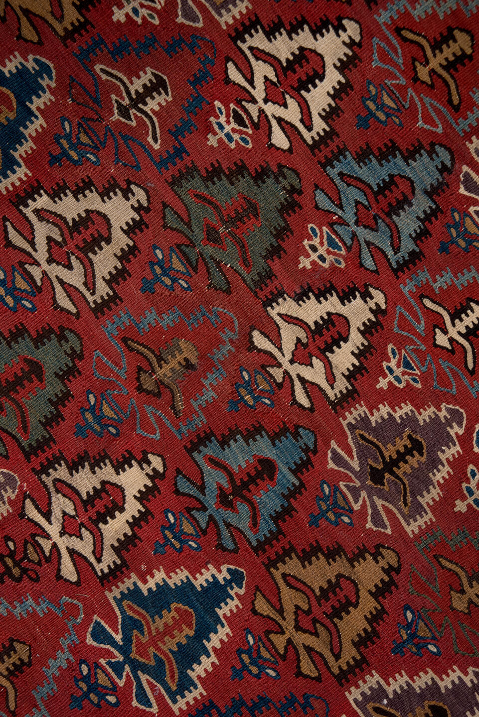 5' x 13' one-of-a-kind handmade antique Kilim rug. Color palette: rust, ivory, indigo, camel, charcoal, sky blue, burgundy