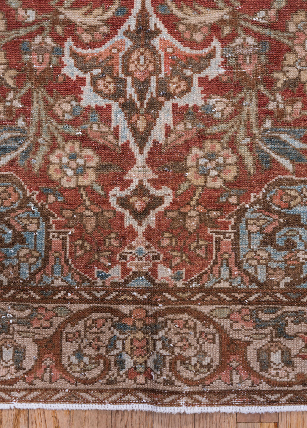 4' x 6' one-of-a-kind handmade vintage Baktiary small size rug. Color palette: rust, taupe, ivory, sky blue, brown, rose