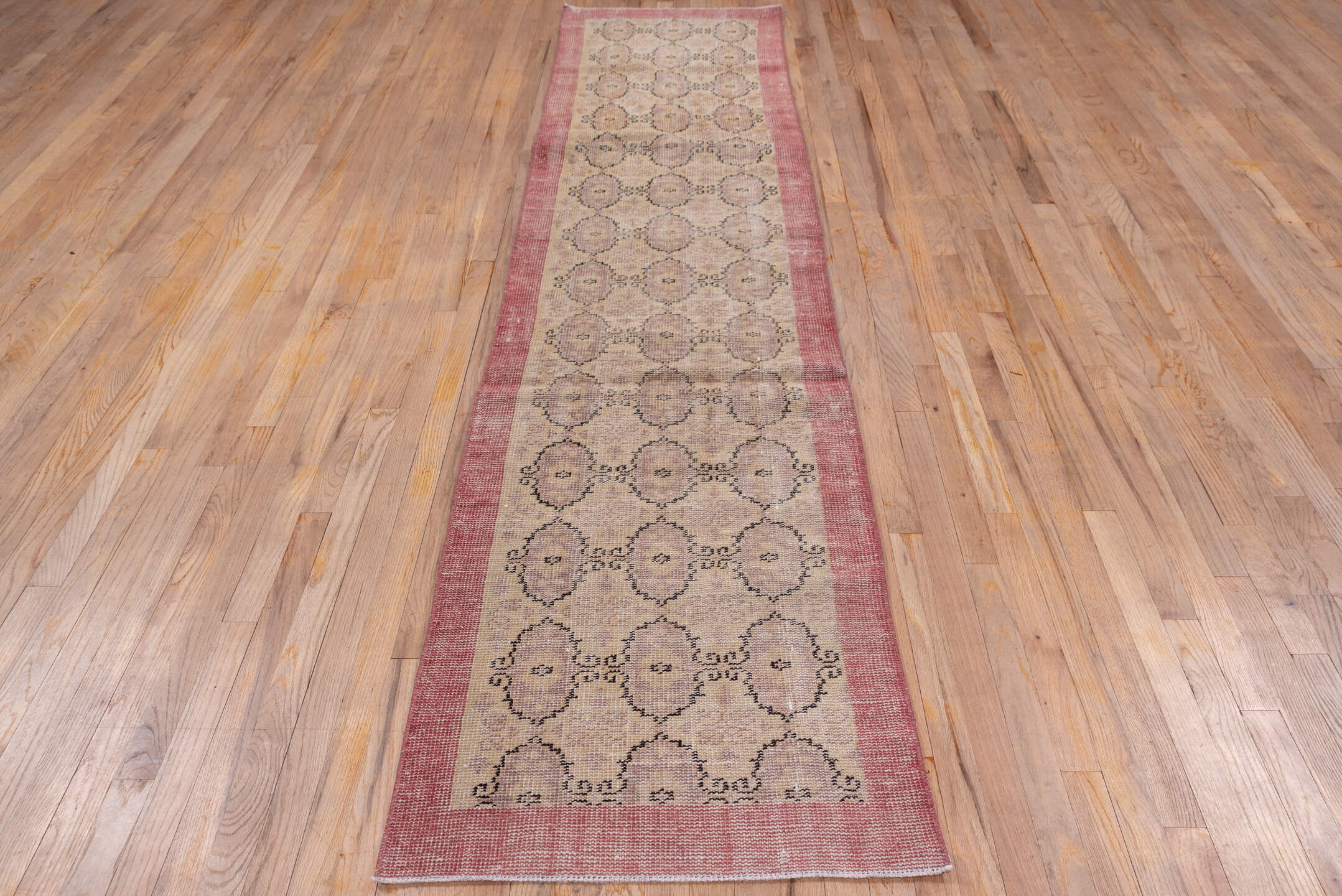 2' x 10' one-of-a-kind handmade vintage Oushak runner rug. Color palette: brown, gray, light gray, off-white, pink, red