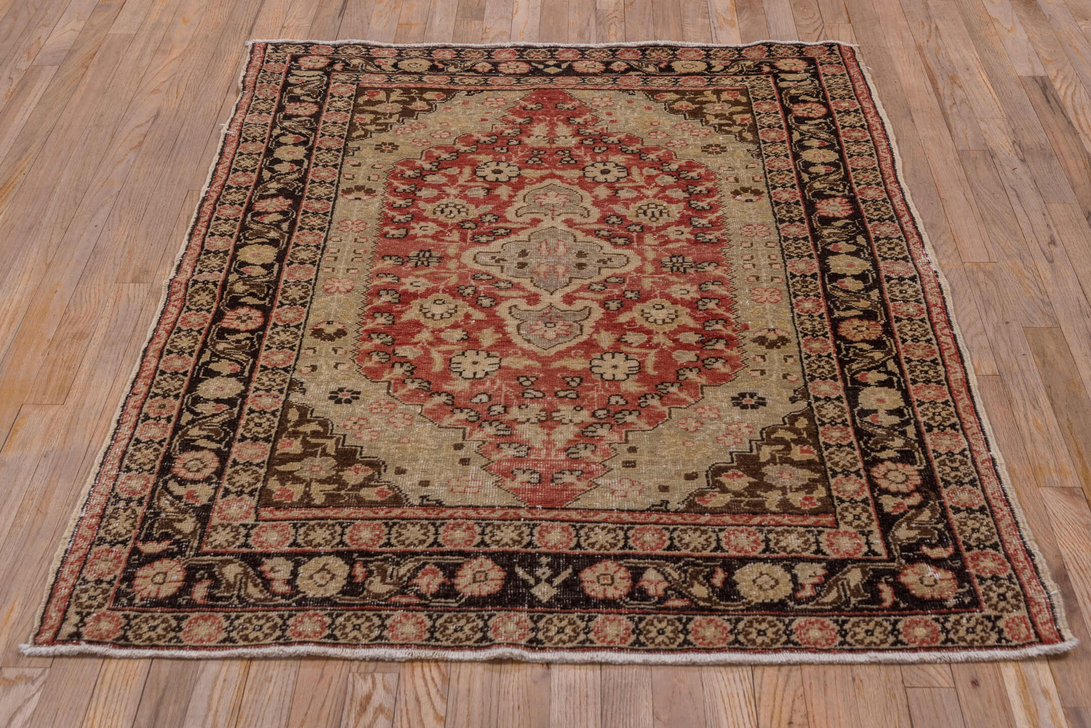 4' x 5' one-of-a-kind handmade vintage Oushak small size rug. Color palette: ivory, terracotta, brown, rose, charcoal, taupe