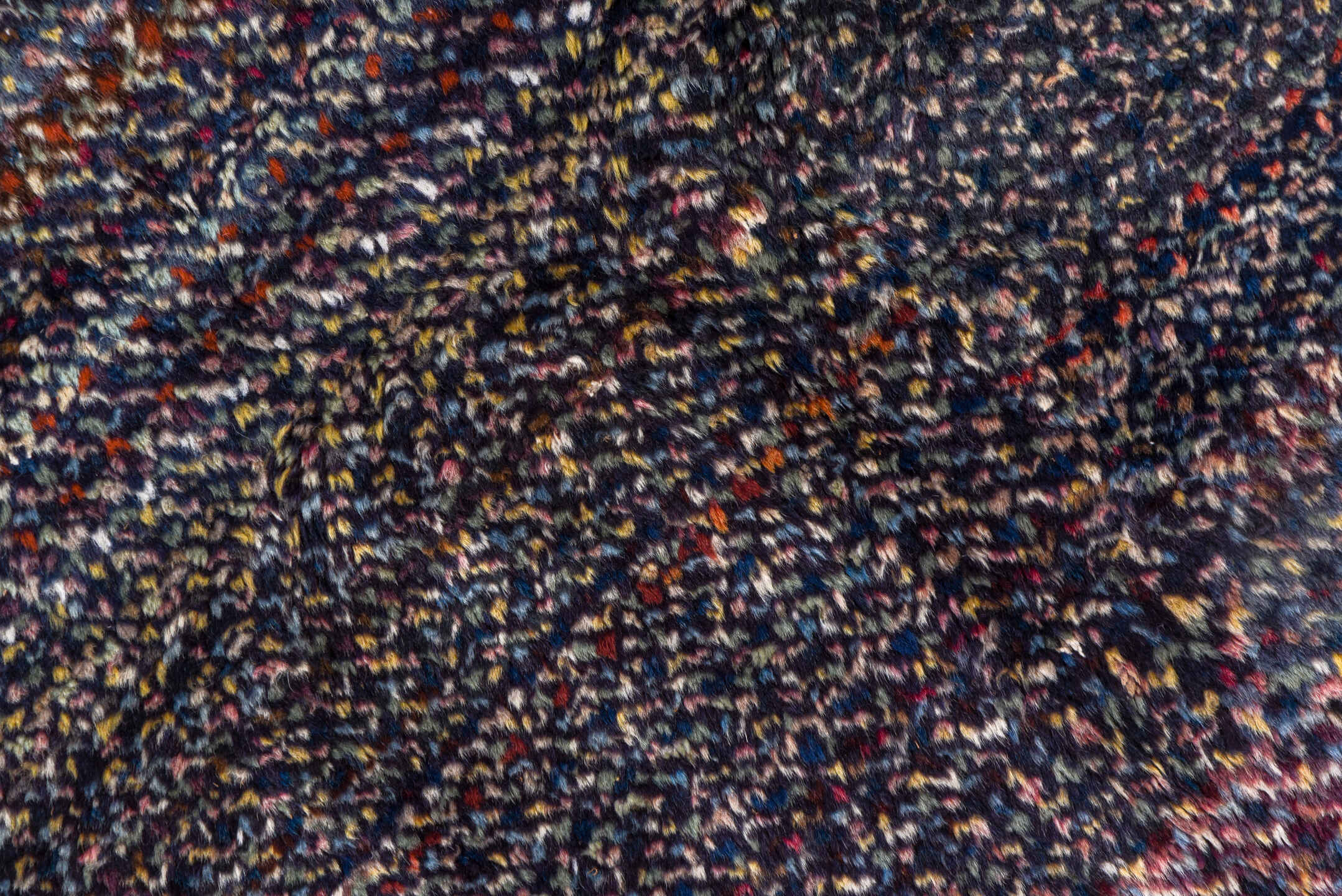 5' x 9' one-of-a-kind handmade vintage Sparta medium size rug. Color palette: indigo, plum, charcoal, rose, lavender, taupe