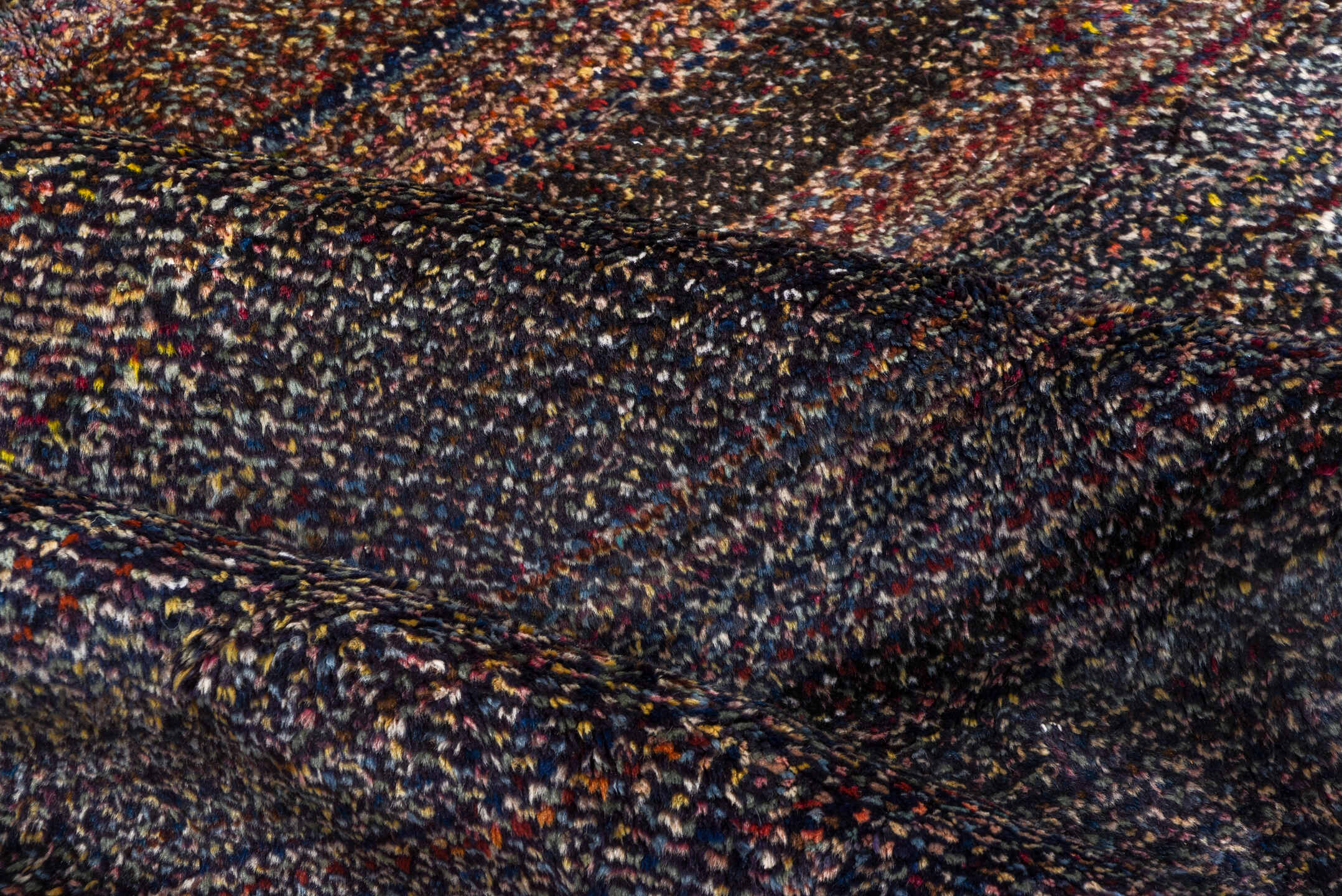 5' x 9' one-of-a-kind handmade vintage Sparta medium size rug. Color palette: indigo, plum, charcoal, rose, lavender, taupe