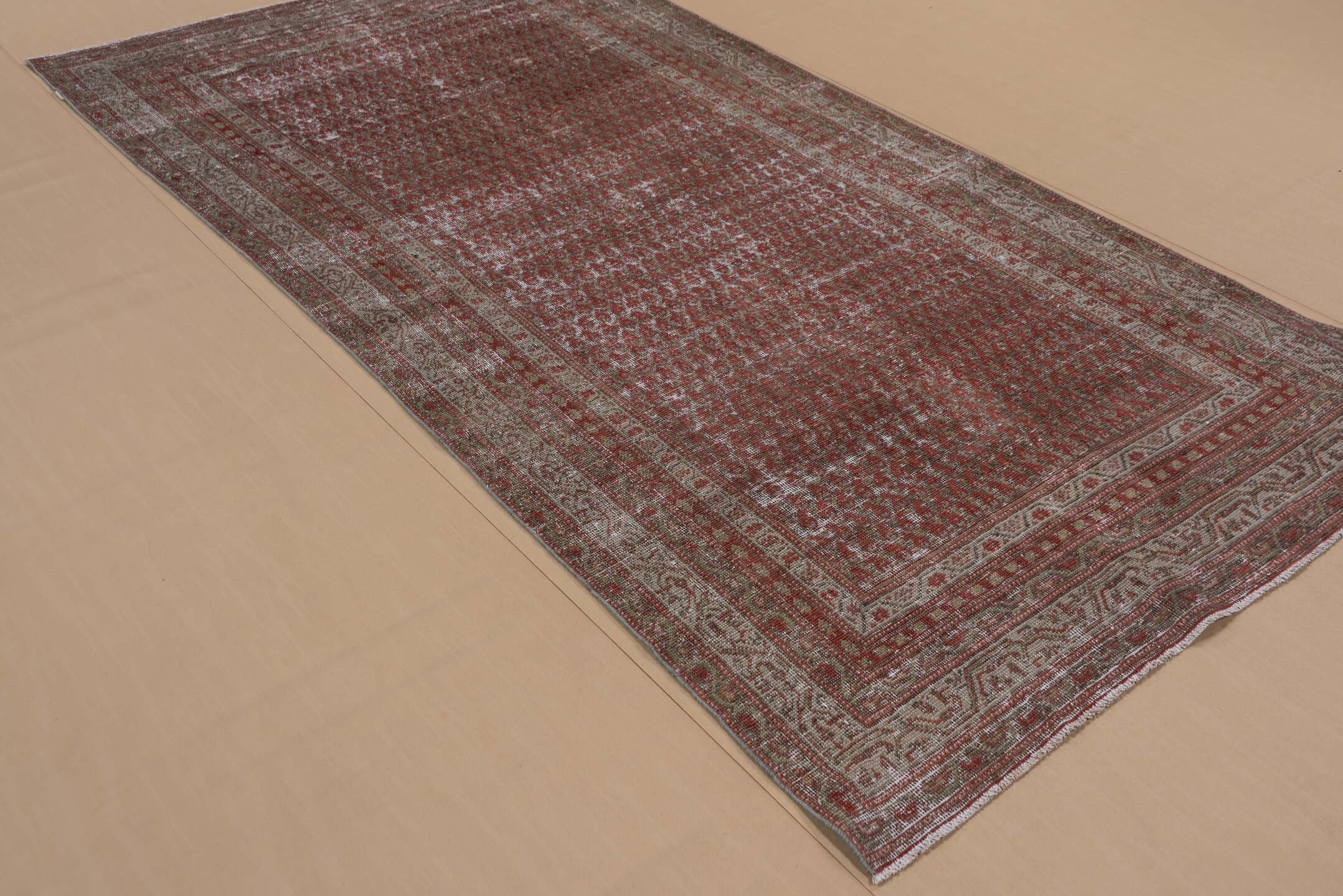 4' x 9' one-of-a-kind handmade vintage Malayer runner rug. Color palette: rust, ivory, taupe, sage, terra cotta, terracotta