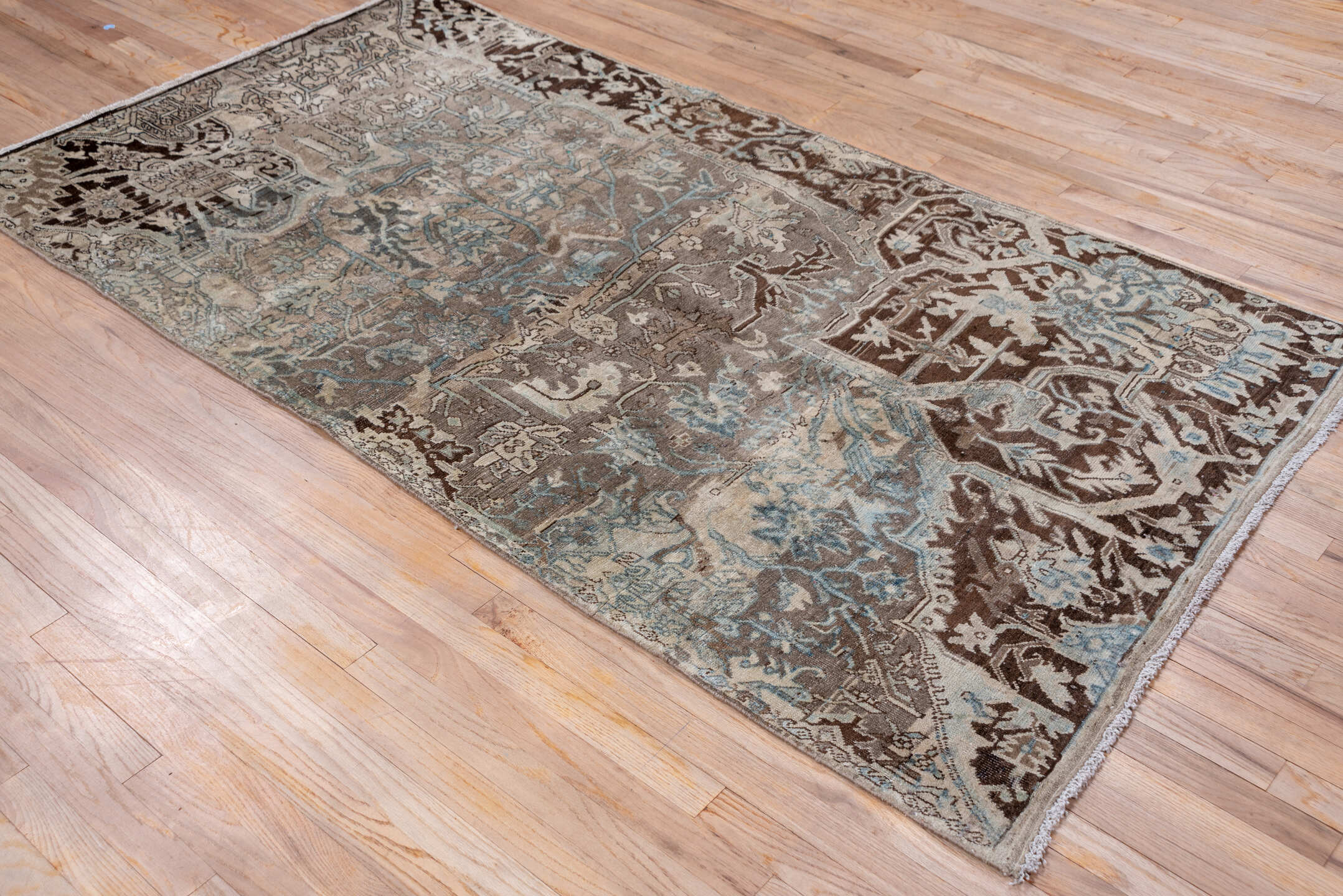 4' x 7' one-of-a-kind handmade vintage Tabriz rug. Color palette: taupe, brown, ivory, charcoal, pale_blue, slate, camel