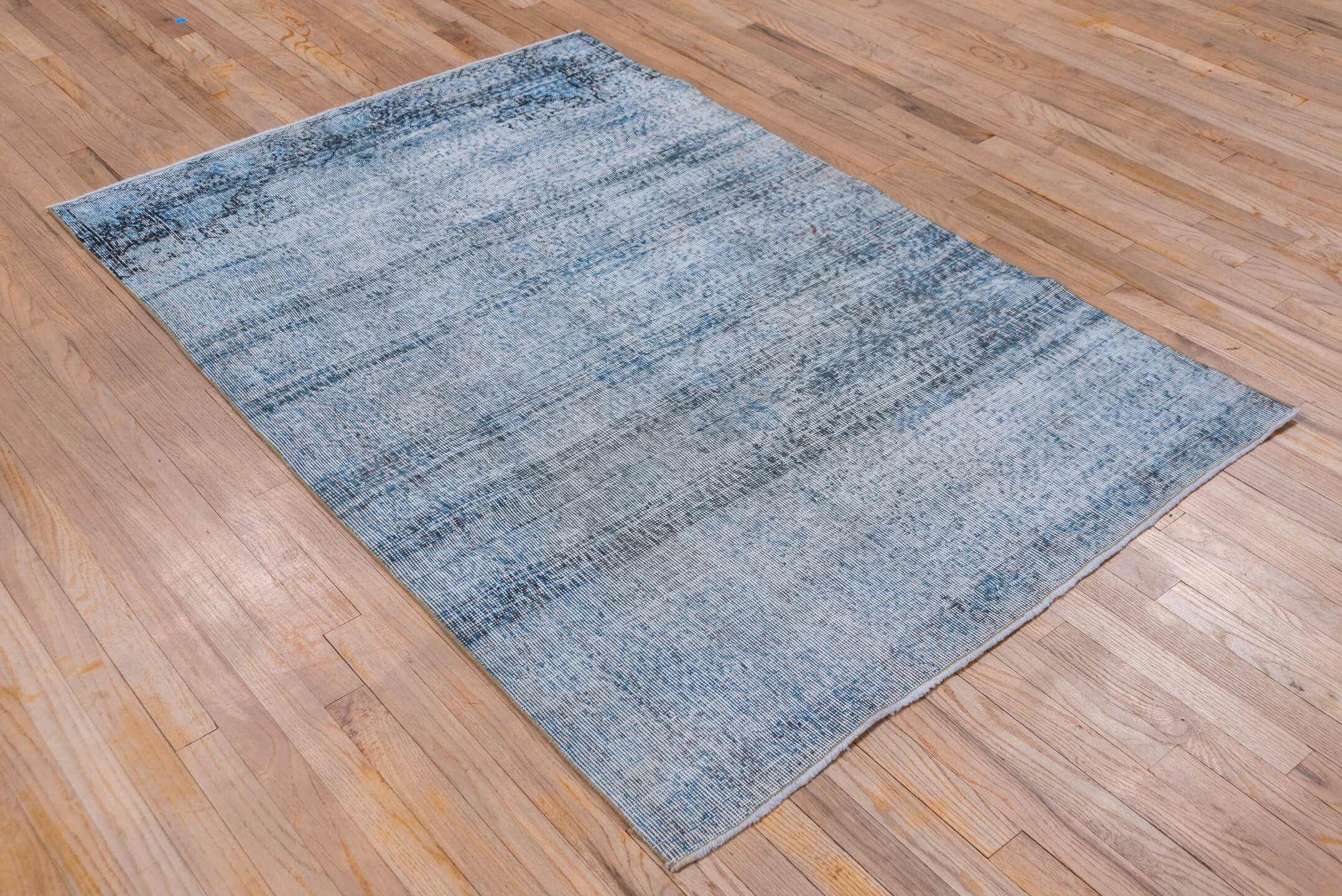 4' x 6' one-of-a-kind handmade vintage Overdyed small size rug. Color palette: pale blue, charcoal, slate, ivory, light blue