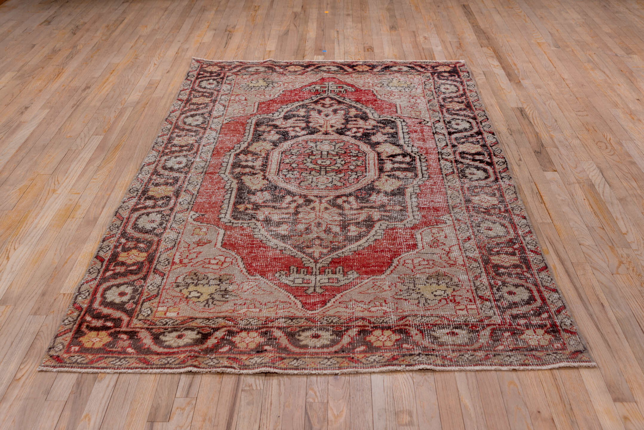 5' x 8' one-of-a-kind handmade vintage Oushak medium size rug. Color palette: rust, ivory, charcoal, taupe, gold, rose