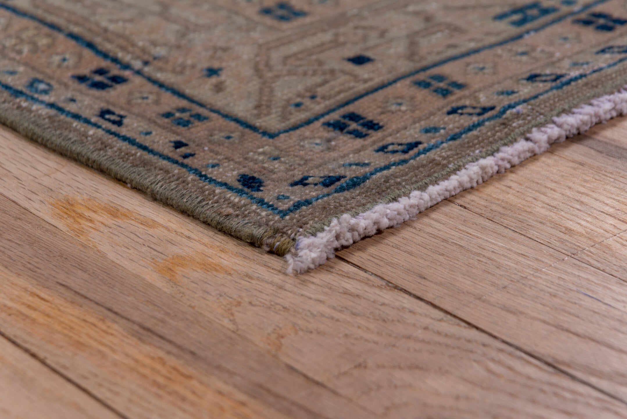 3' x 10' one-of-a-kind handmade vintage Mahal runner rug. Color palette: taupe, brown, beige, indigo, ivory, camel, gray