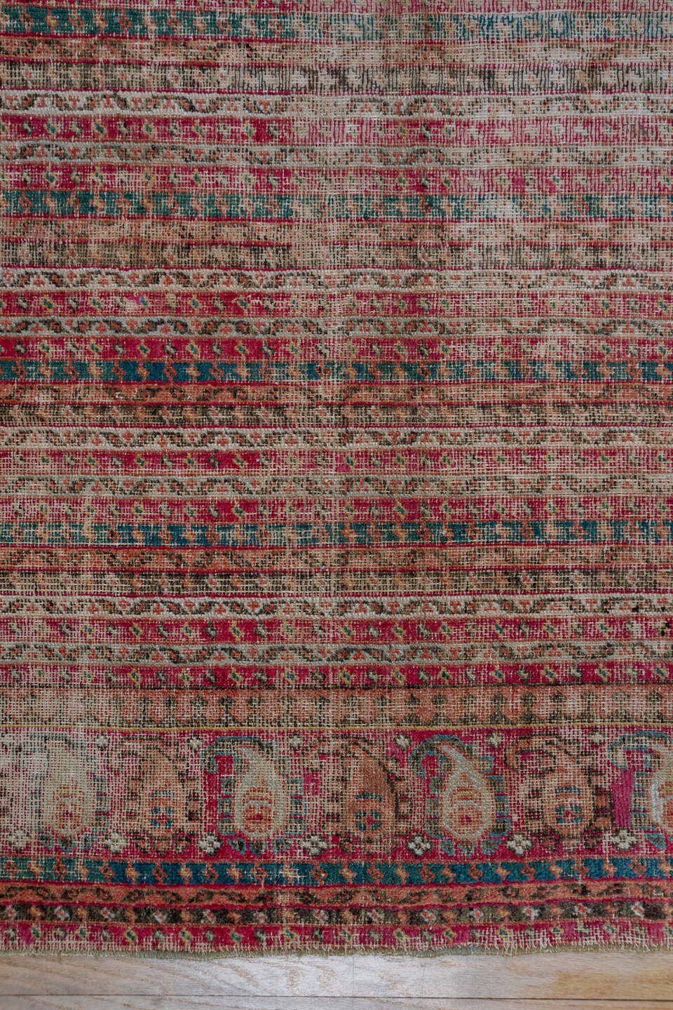6' x 12' one-of-a-kind handmade vintage Ghordes large size rug. Color palette: black, blue, brown, charcoal, gray, pink, red