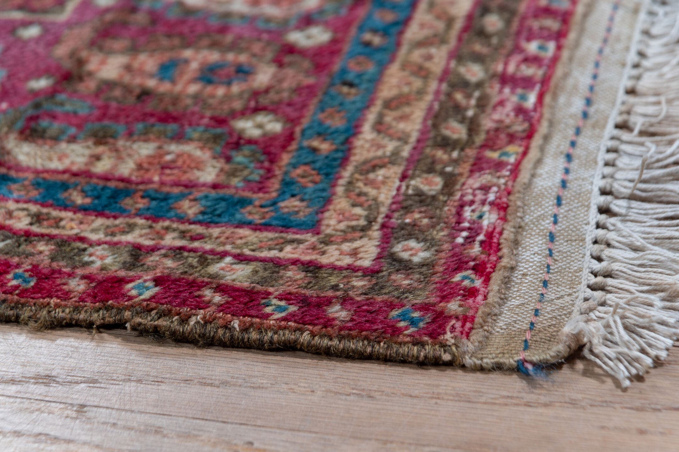 6' x 12' one-of-a-kind handmade antique Ghordes large size rug. Color palette: rust, brick, ivory, navy, rose, taupe