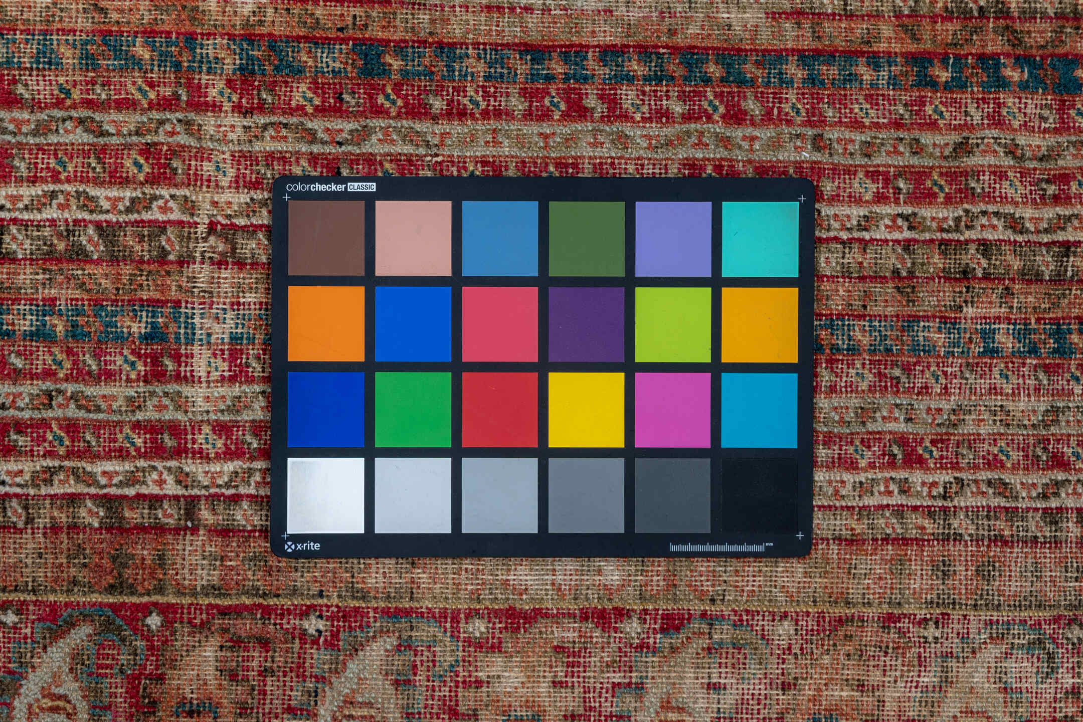 6' x 12' one-of-a-kind handmade vintage Ghordes large size rug. Color palette: black, blue, brown, charcoal, gray, pink, red