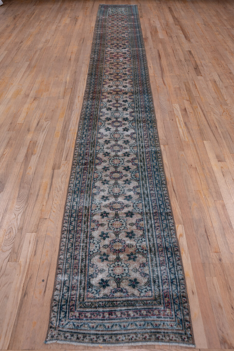 2' x 17' one-of-a-kind handmade vintage Khorassan runner rug. Color palette: black, blue, brown, charcoal, gray, off-white