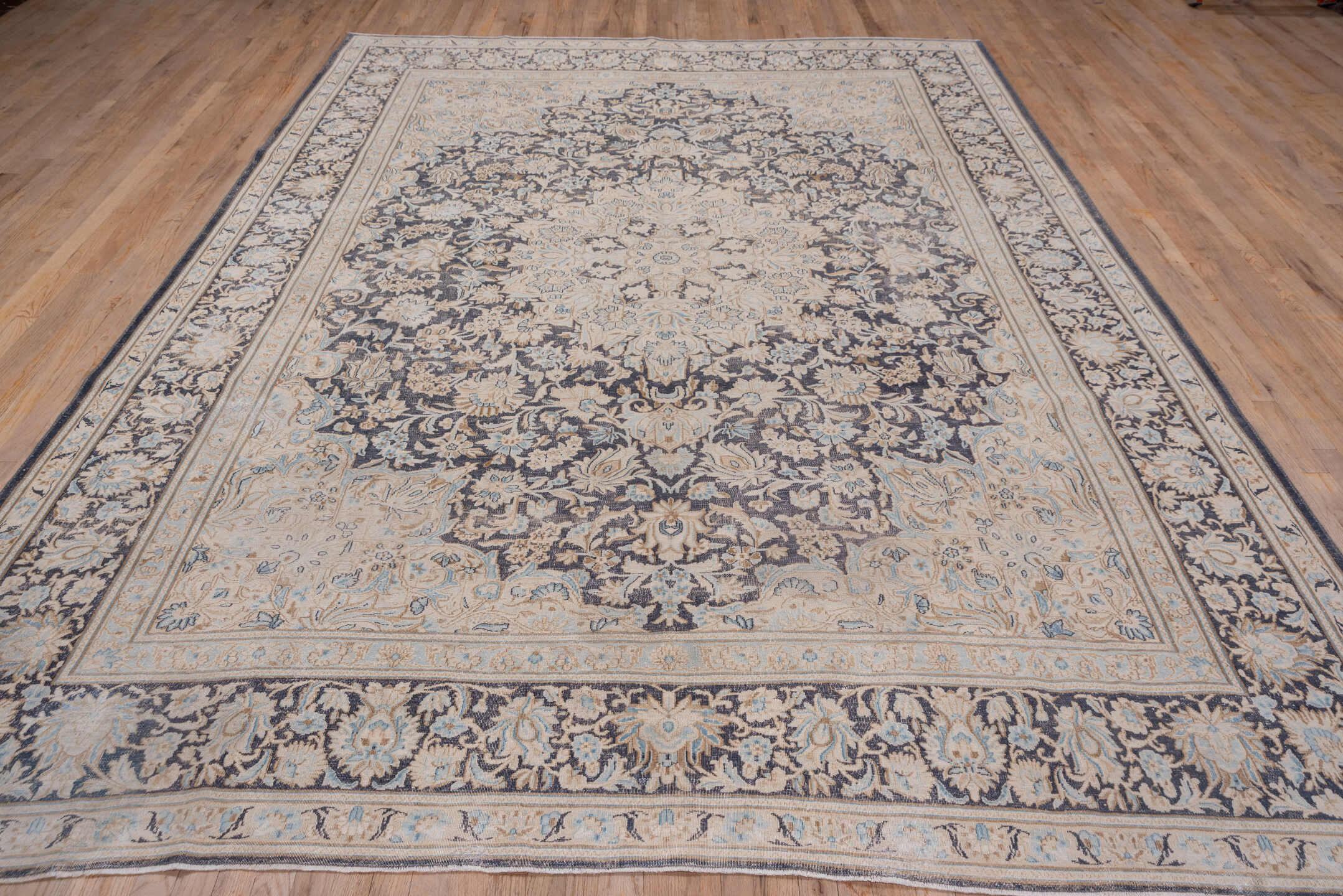 9' x 12' one-of-a-kind handmade antique Kerman large size rug. Color palette: ivory, navy, beige, pale blue, taupe, charcoal