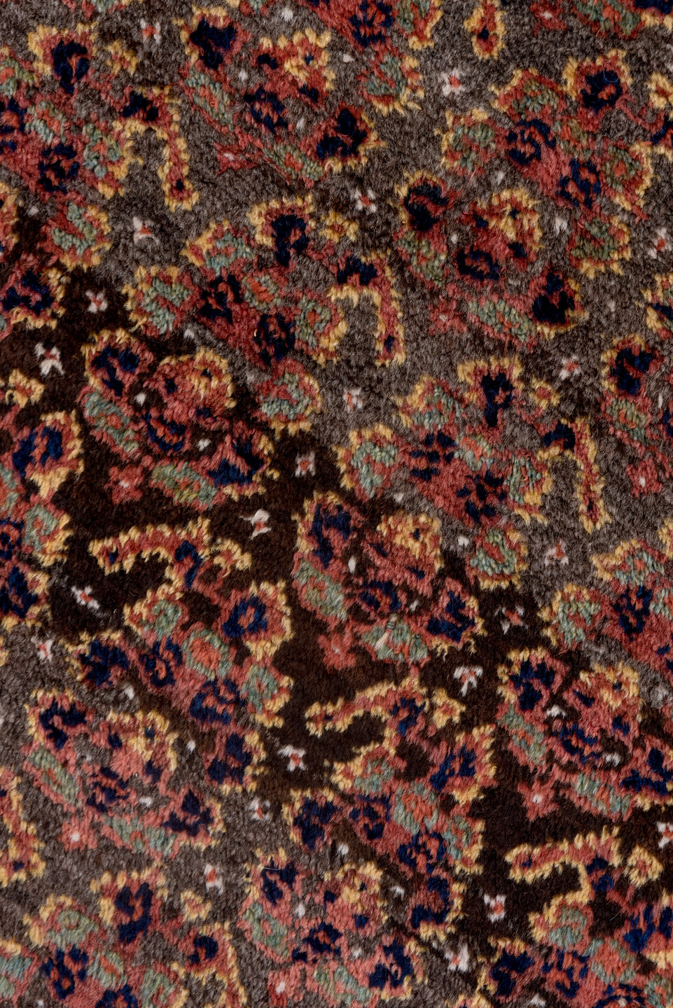 4' x 9' one-of-a-kind handmade antique Kurd rug. Color palette: rust, navy, brown, rose, ivory, gold, sage, terracotta, blue