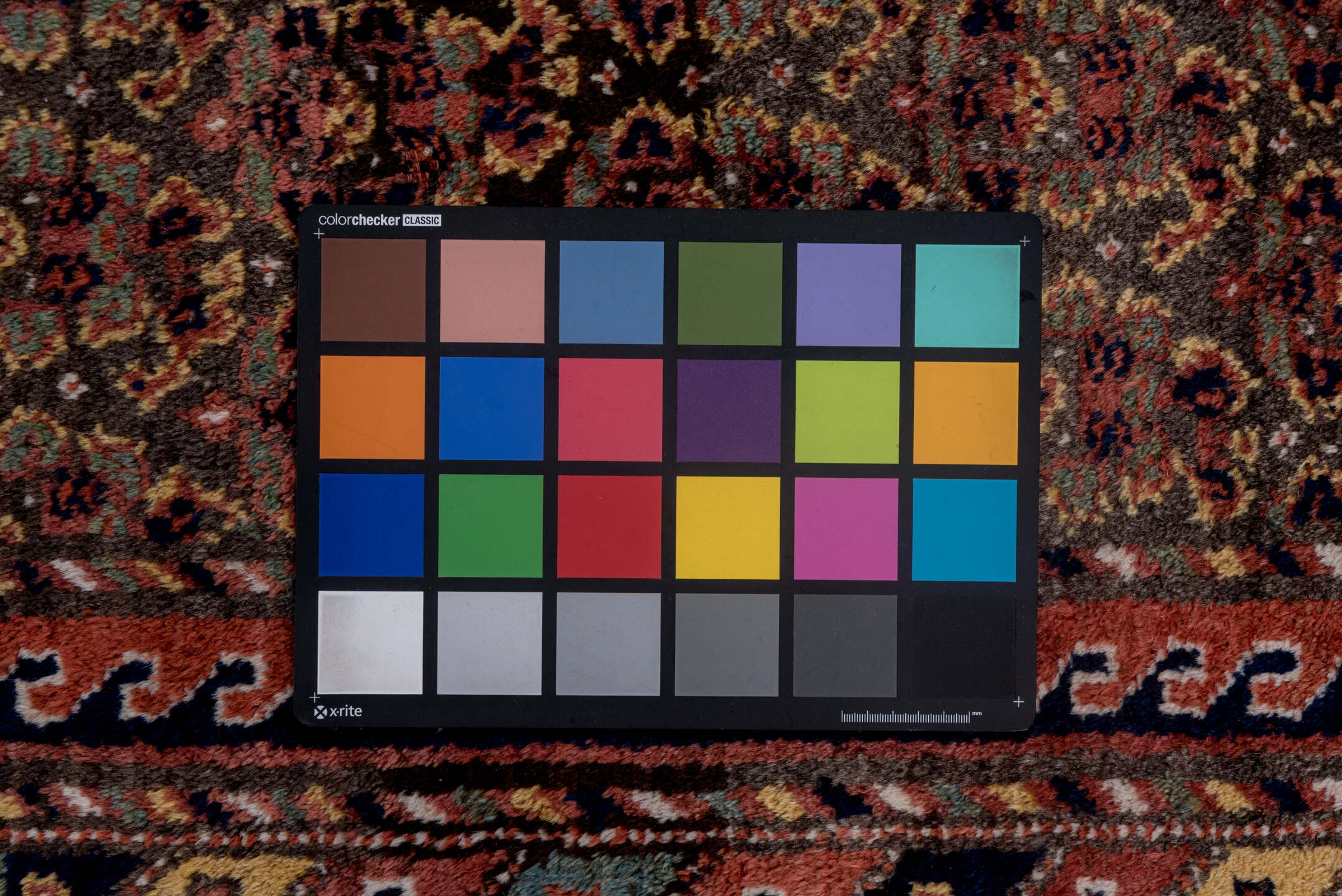 4' x 9' one-of-a-kind handmade vintage Kurd rug. Color palette: brown, dark gray, gray, light gray, off-white, pink, red