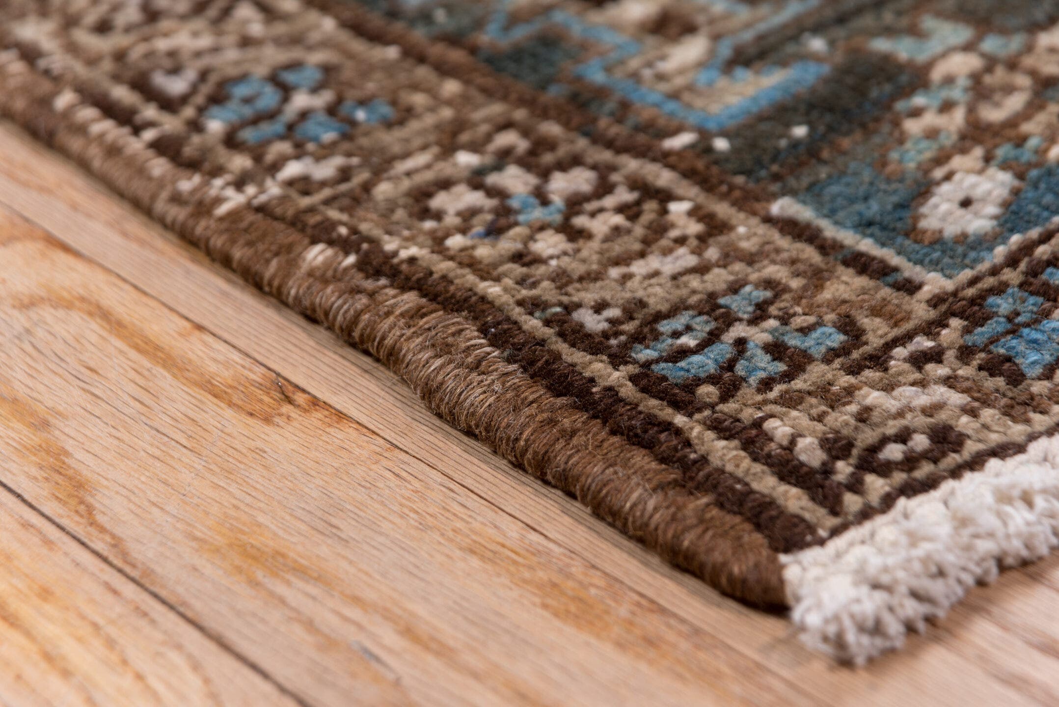 6' x 9' one-of-a-kind handmade antique Heriz medium size rug. Color palette: ivory, blue, taupe, brown, sky blue, charcoal