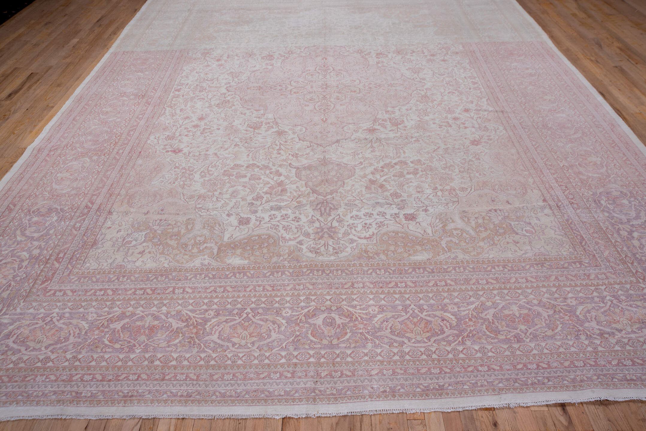 11' x 14' one-of-a-kind handmade antique Tabriz oversize rug. Color palette: ivory, blush, rose, pale lavender, taupe, peach