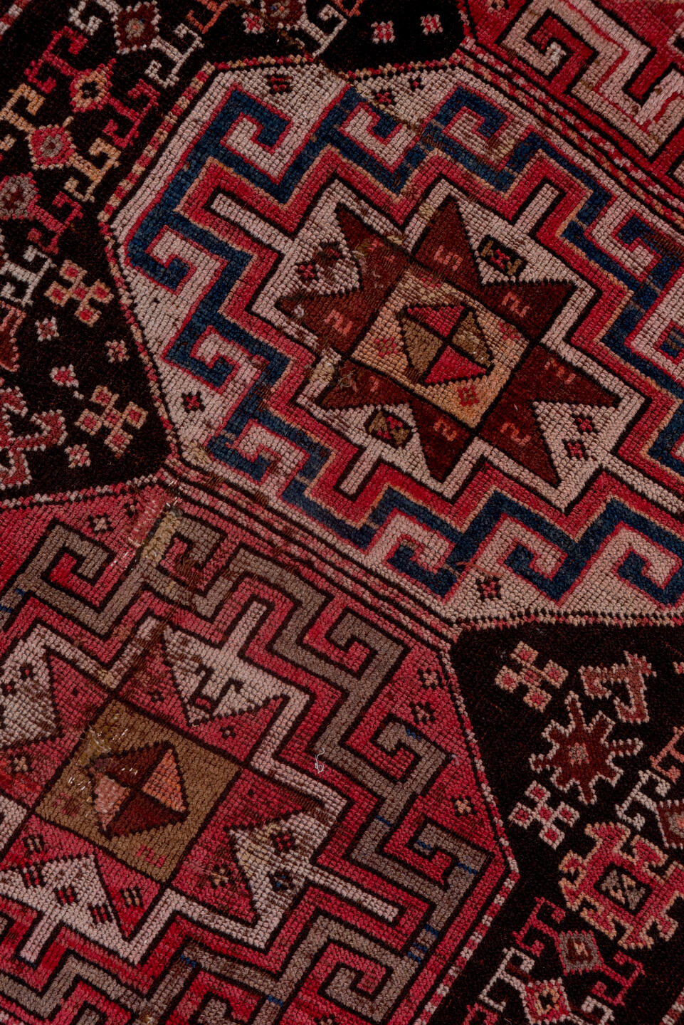 4' x 9' one-of-a-kind handmade vintage Kazak runner rug. Color palette: brown, gray, pink, red, rosy brown