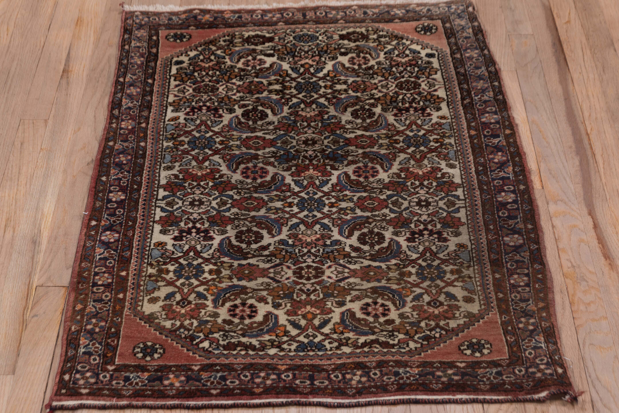 2' x 4' one-of-a-kind handmade antique Malayer small size rug. Color palette: ivory, rose, rust, indigo, soft blue, burgundy