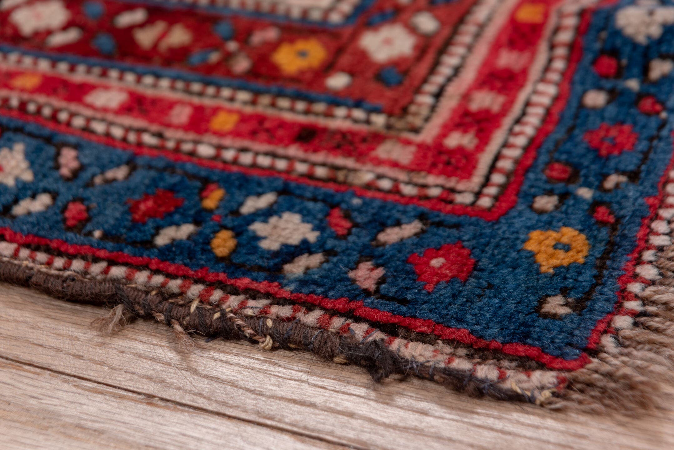 3' x 8' one-of-a-kind handmade antique Karabagh runner rug. Color palette: rose, indigo, crimson, ivory, navy, gold, coral