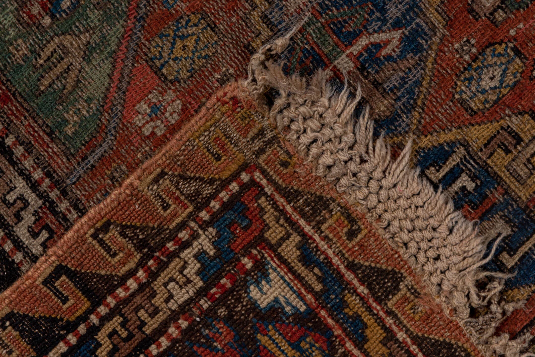 6' x 10' one-of-a-kind handmade antique Sumak large size rug. Color palette: rust, indigo, ivory, camel, aqua, charcoal