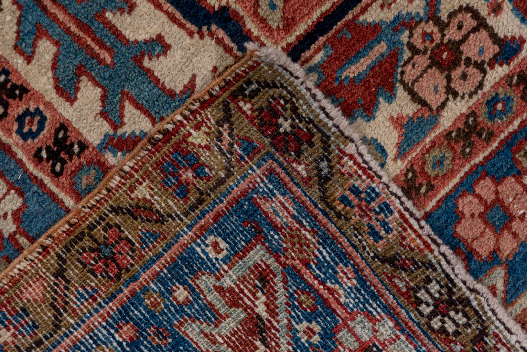 8' x 12' one-of-a-kind handmade antique Heriz large size rug. Color palette: rust, blue, ivory, navy, terra cotta, slate