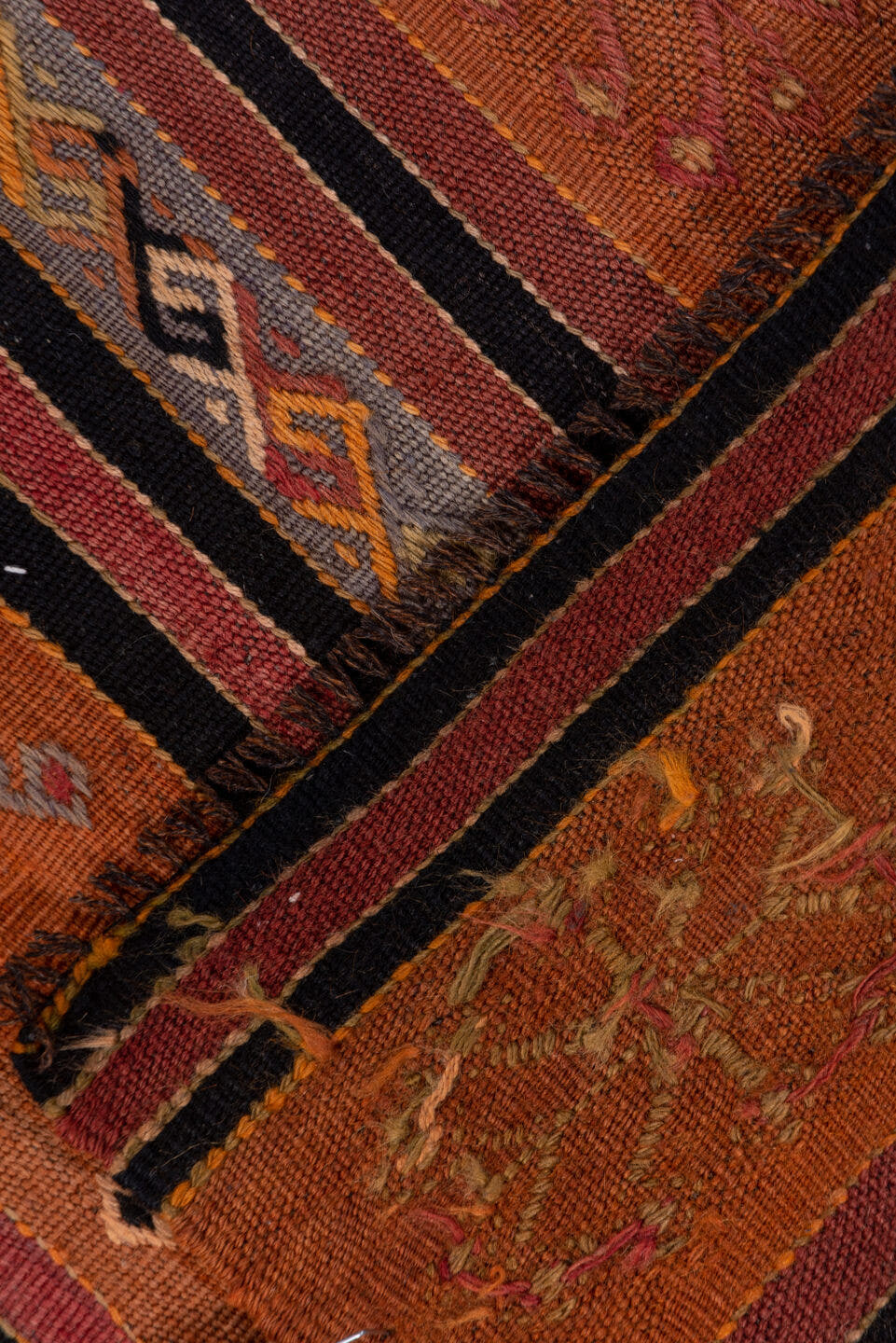 2' x 8' one-of-a-kind handmade vintage Kilim runner rug. Color palette: terra cotta, rust, charcoal, ivory, gold, rose