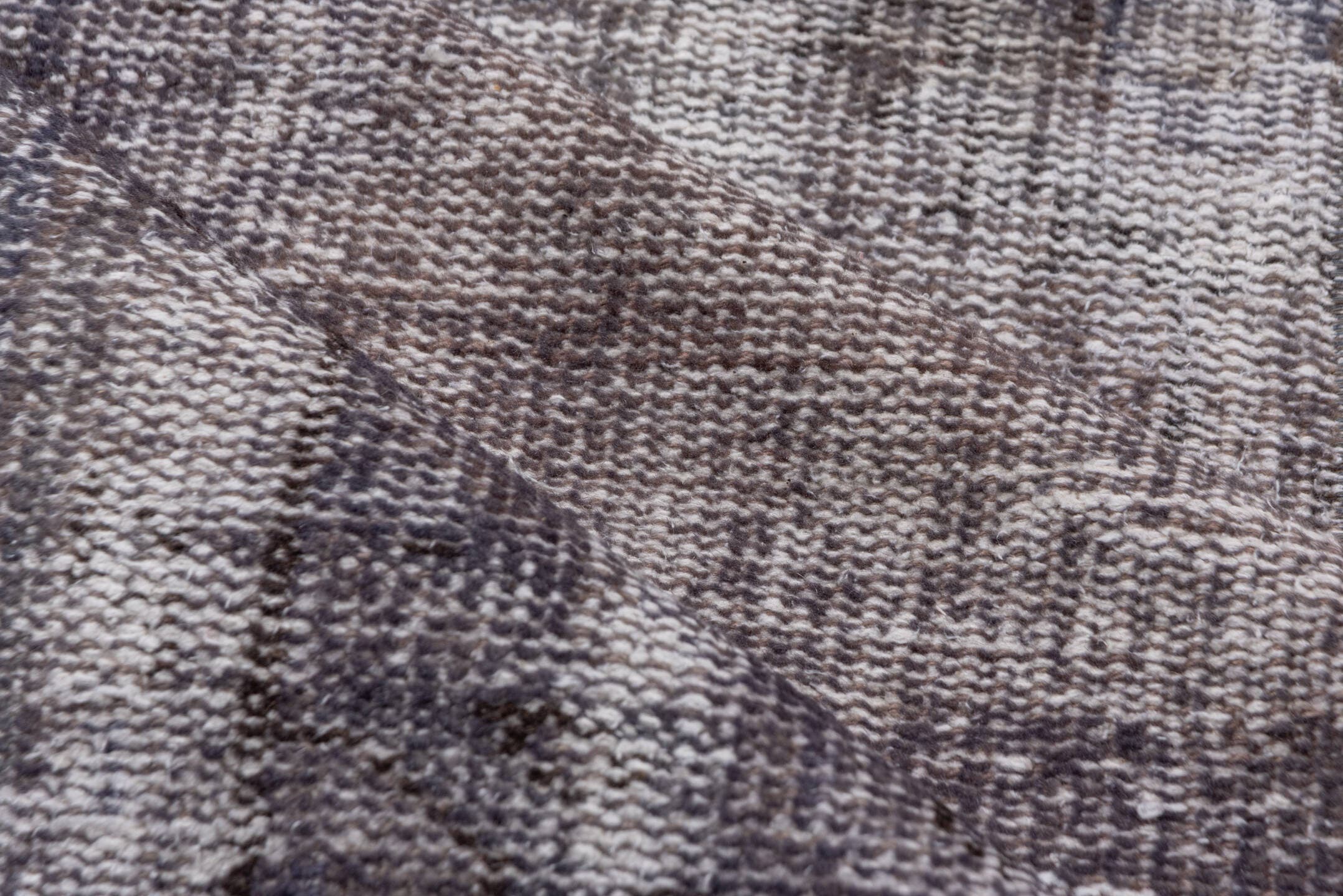 2' x 9' one-of-a-kind handmade vintage Overdyed runner rug. Color palette: taupe, charcoal, gray, ivory, beige, black