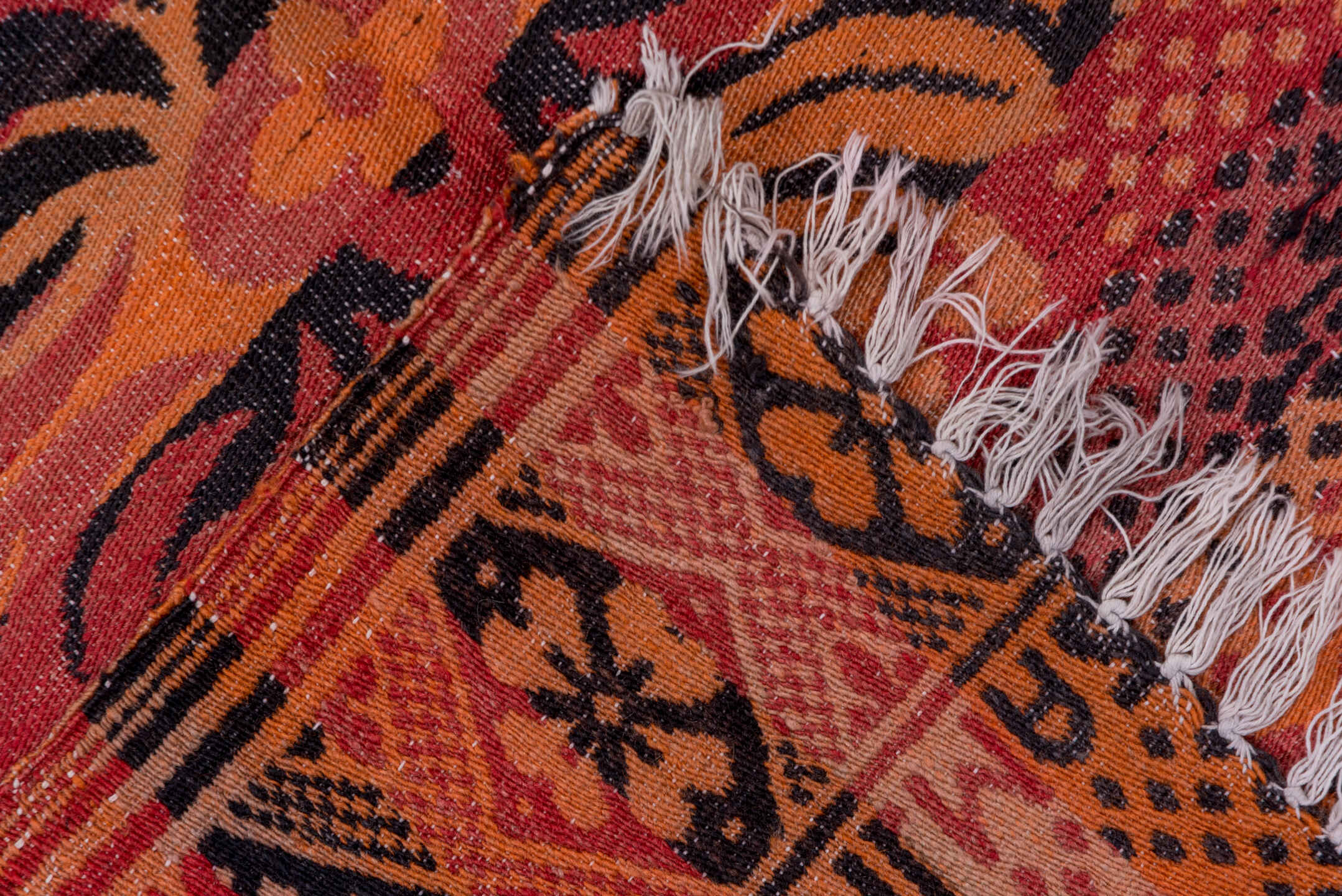 5' x 11' one-of-a-kind handmade antique Kilim rug. Color palette: terra cotta, rust, coral, mahogany, burgundy, rose