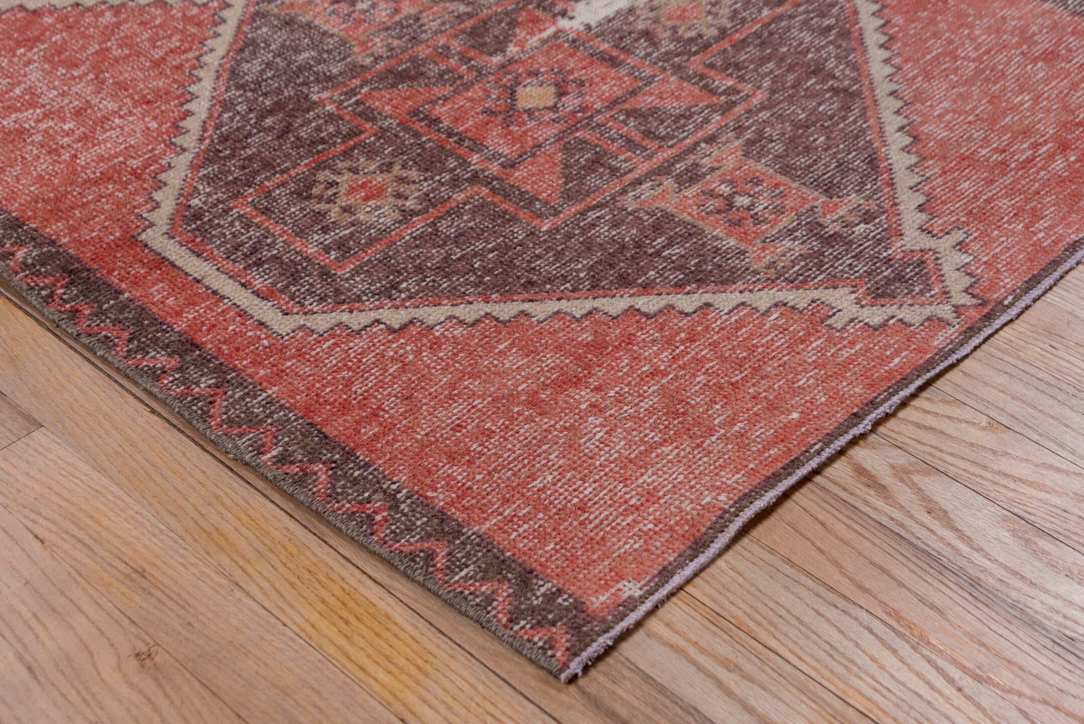 2' x 6' one-of-a-kind handmade vintage Oushak runner rug. Color palette: terra cotta, plum, ivory, charcoal, rose, taupe