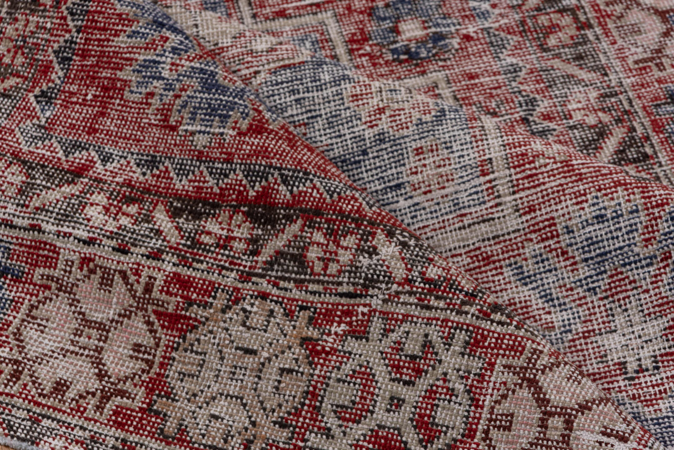 4' x 9' one-of-a-kind handmade vintage Oushak rug. Color palette: burgundy, dusty blue, rose, ivory, charcoal, taupe, blue
