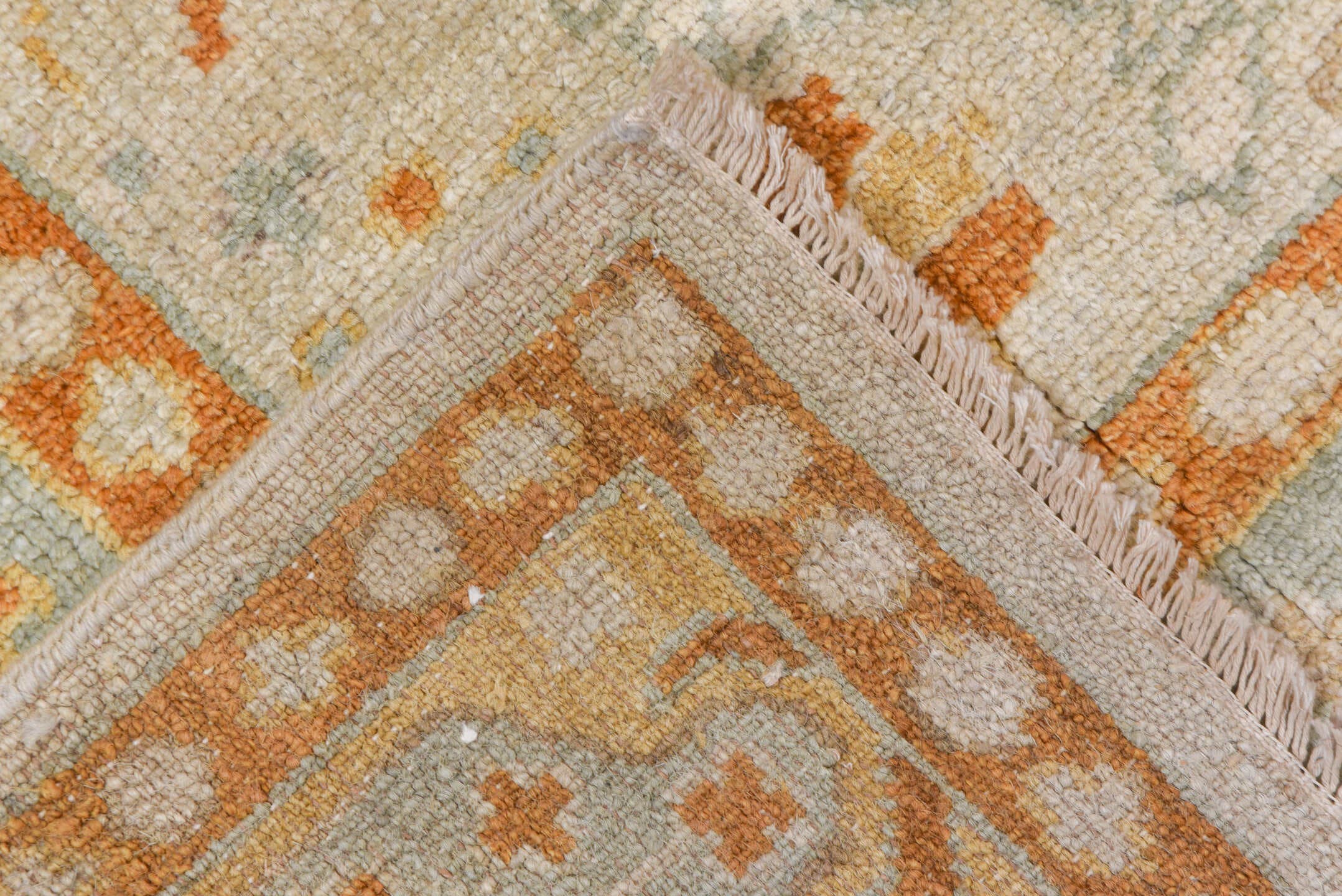 8' x 9' one-of-a-kind handmade vintage Oushak rug. Color palette: ivory, pale blue, gold, sand, taupe, terra cotta