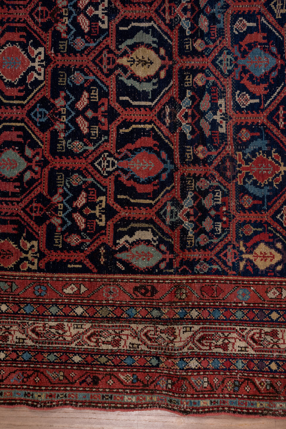 5' x 12' one-of-a-kind handmade antique Malayer rug. Color palette: navy, rust, ivory, crimson, slate, camel, blue