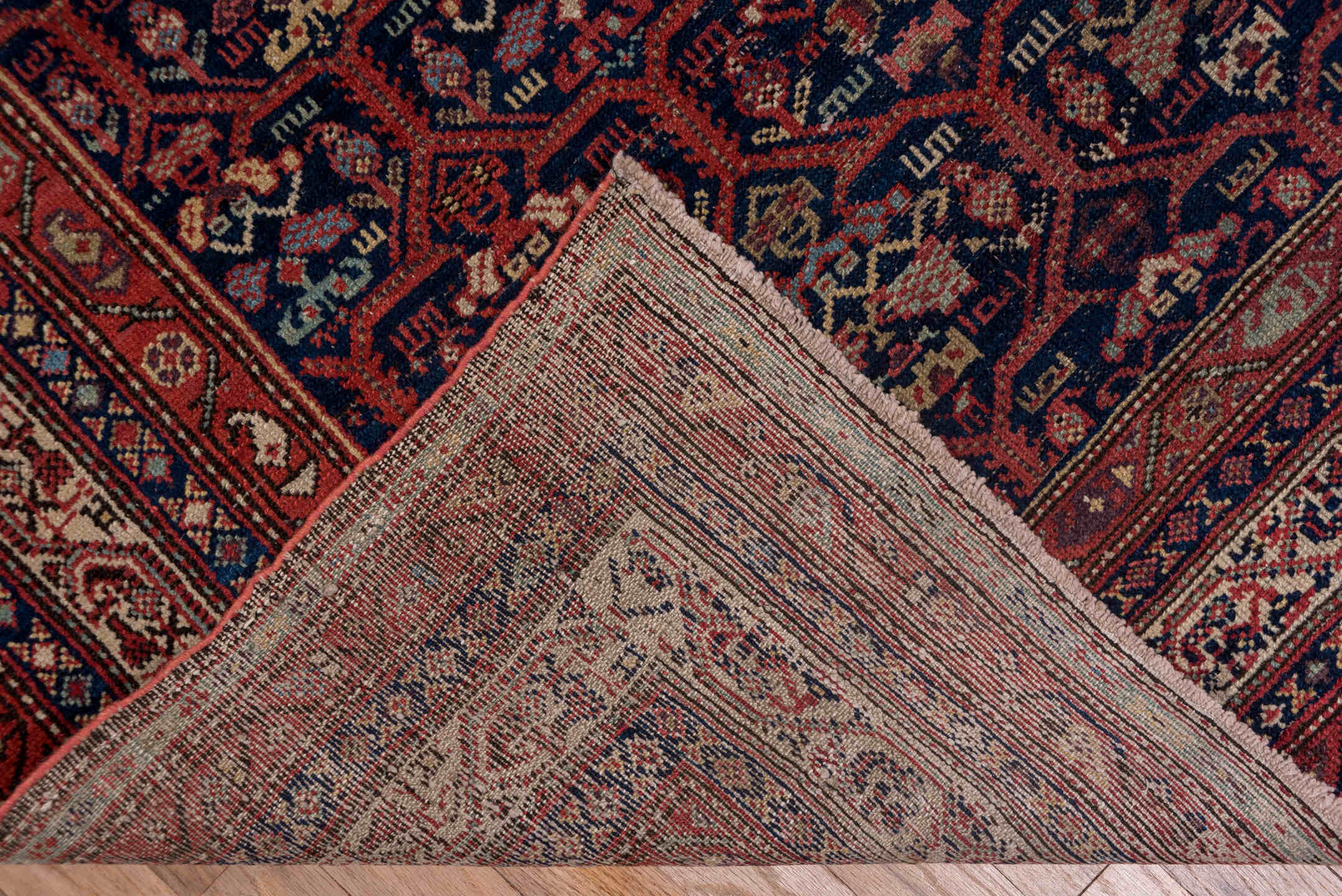 5' x 12' one-of-a-kind handmade antique Malayer rug. Color palette: navy, rust, ivory, crimson, slate, camel, blue