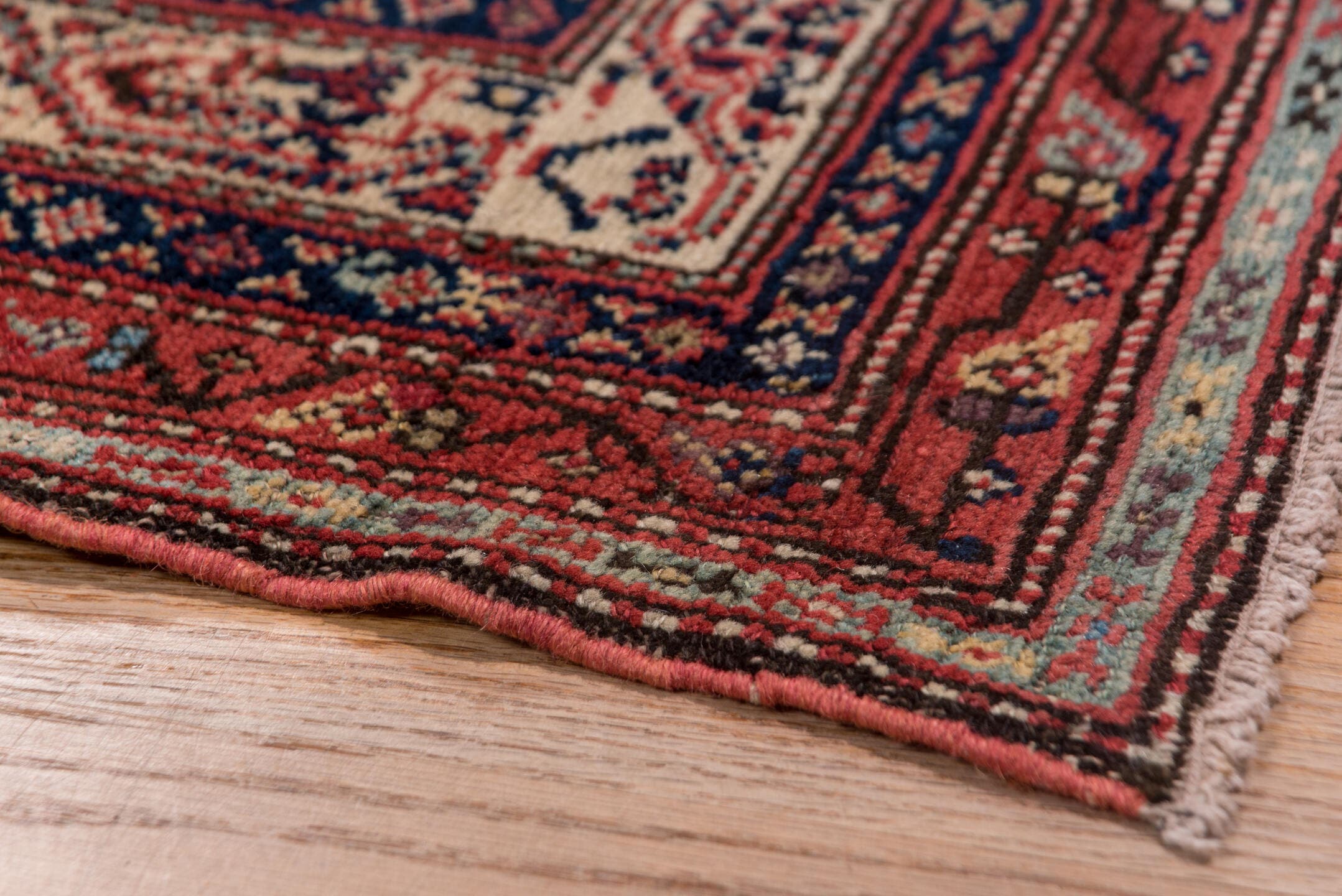 5' x 12' one-of-a-kind handmade antique Malayer rug. Color palette: navy, rust, ivory, crimson, slate, camel, blue