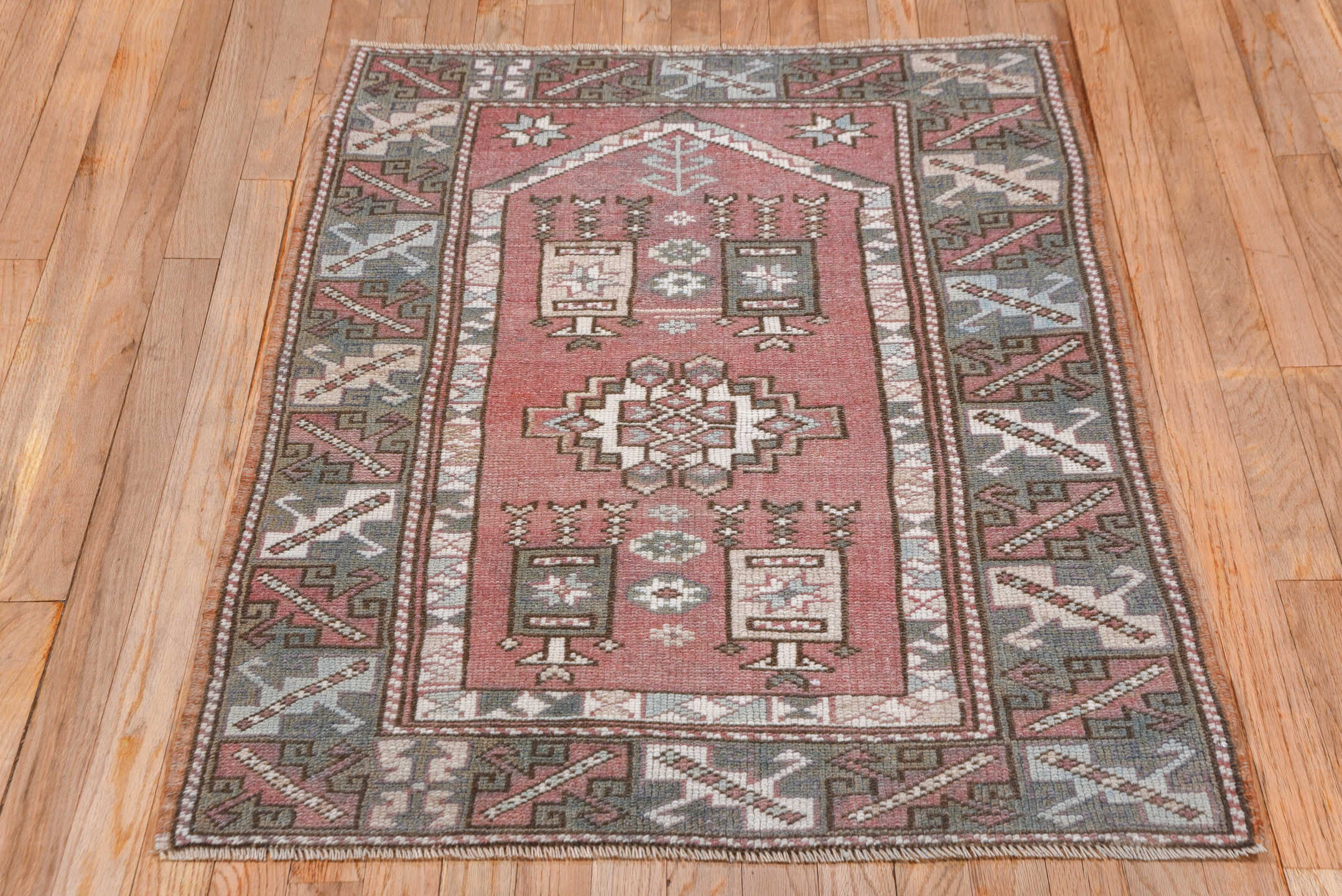 2' x 4' one-of-a-kind handmade vintage Oushak small size rug. Color palette: rose, taupe, slate, ivory, brown, dusty pink