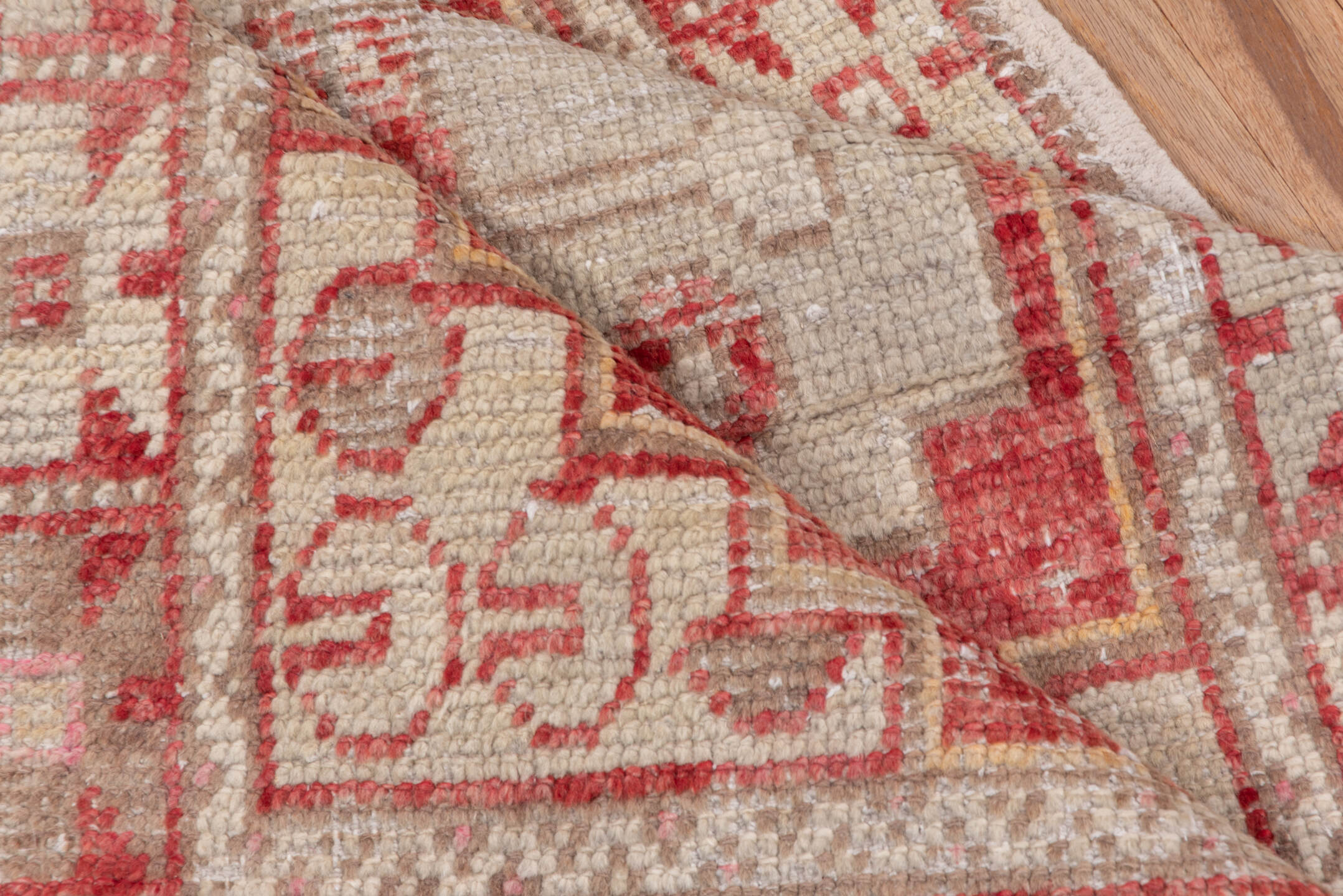 2' x 4' one-of-a-kind handmade vintage Oushak small size rug. Color palette: ivory, coral, rose, taupe, peach, camel