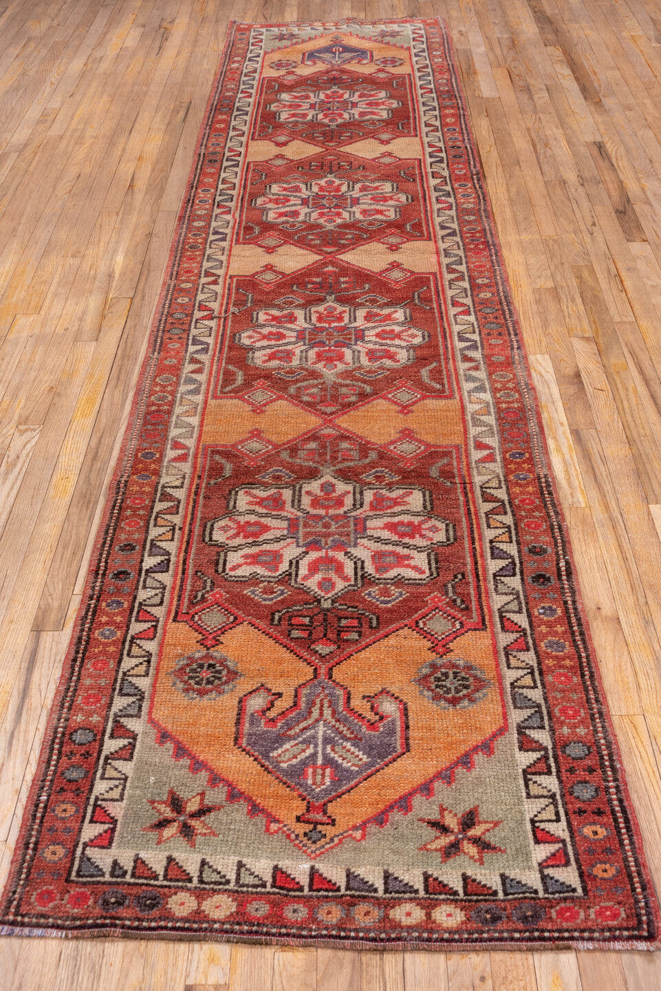 3' x 13' one-of-a-kind handmade vintage Oushak runner rug. Color palette: rust, peach, ivory, brick, slate, charcoal, rose