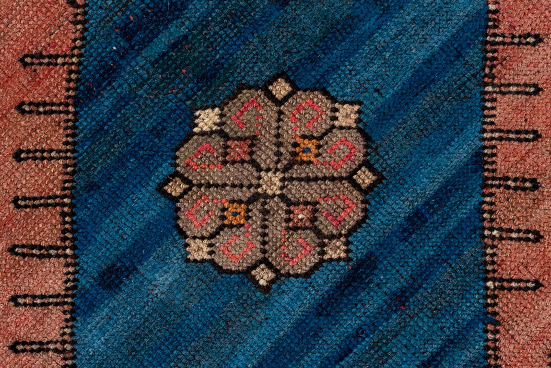 4' x 12' one-of-a-kind handmade vintage Oushak runner rug. Color palette: black, blue, brown, gray, pink, red