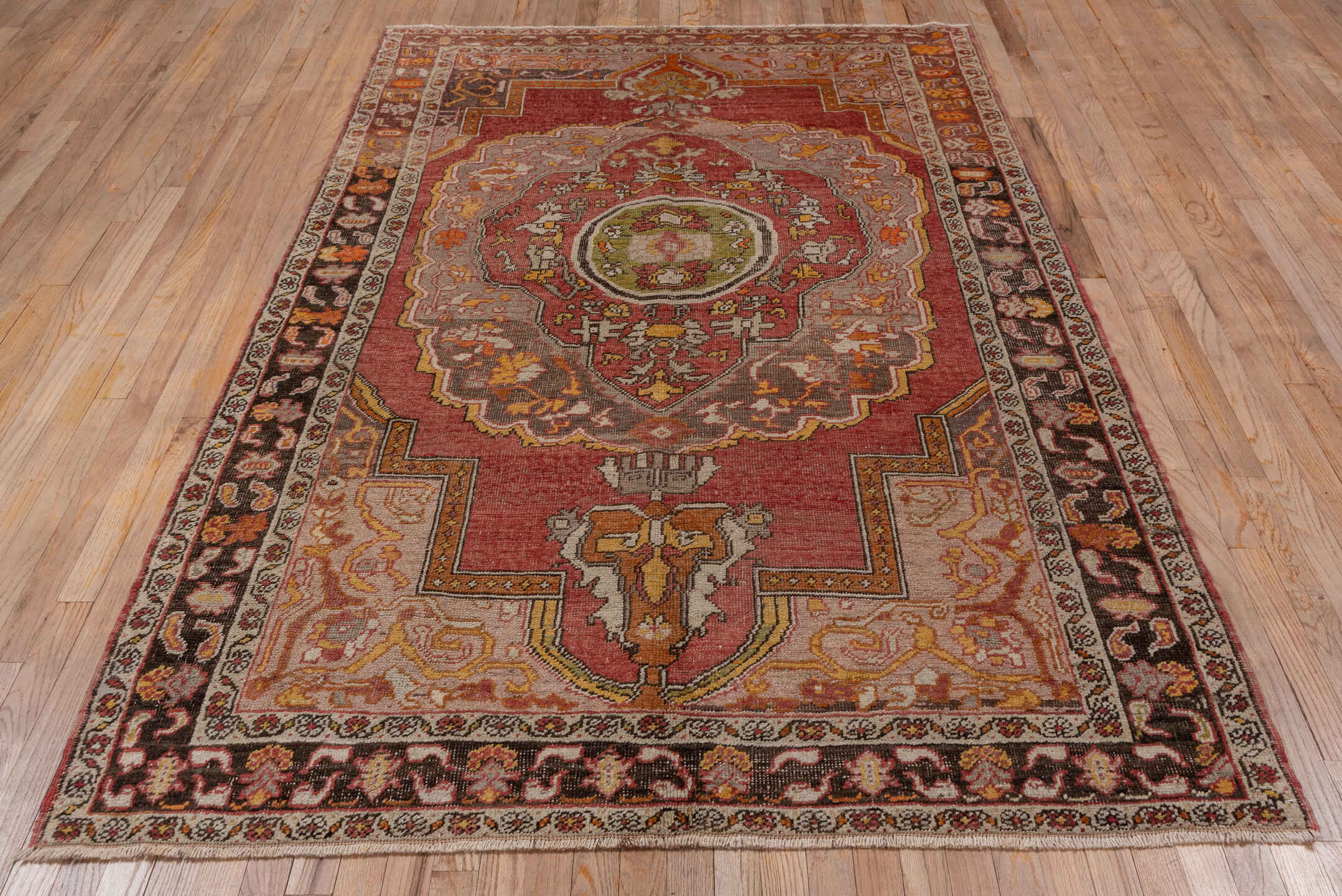 5' x 8' one-of-a-kind handmade vintage Oushak medium size rug. Color palette: rose, charcoal, lavender, ivory, gold, rust