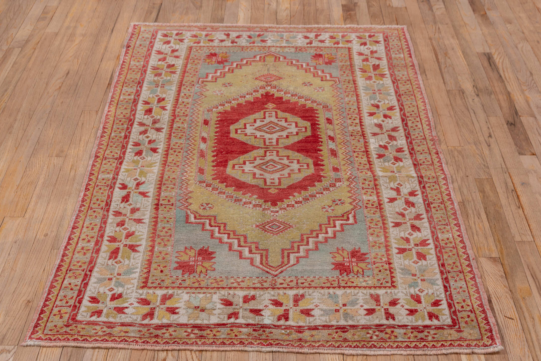 3' x 5' one-of-a-kind handmade vintage Oushak small size rug. Color palette: coral, ivory, gold, pale blue, saffron, rose