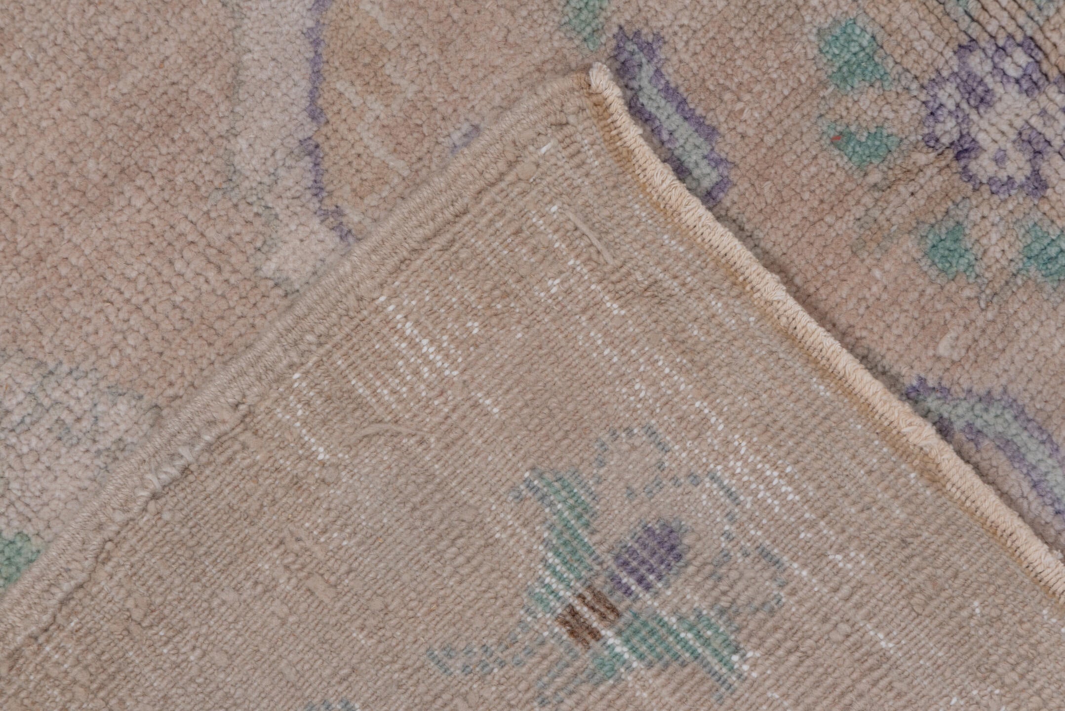 4' x 7' one-of-a-kind handmade vintage Oushak rug. Color palette: blush, ivory, mint, lavender, taupe, sage, pink, green