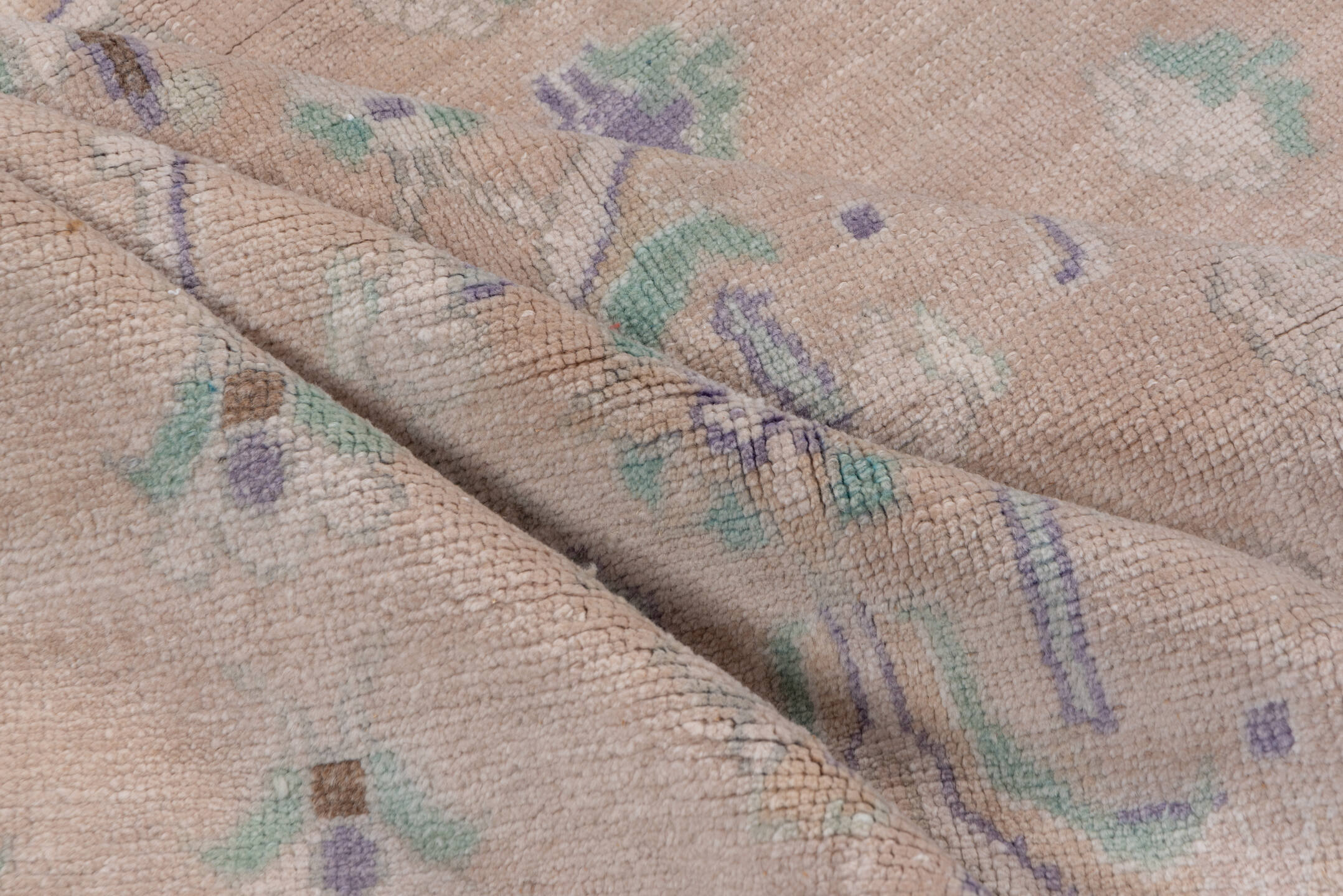 4' x 7' one-of-a-kind handmade vintage Oushak rug. Color palette: blush, ivory, mint, lavender, taupe, sage, pink, green