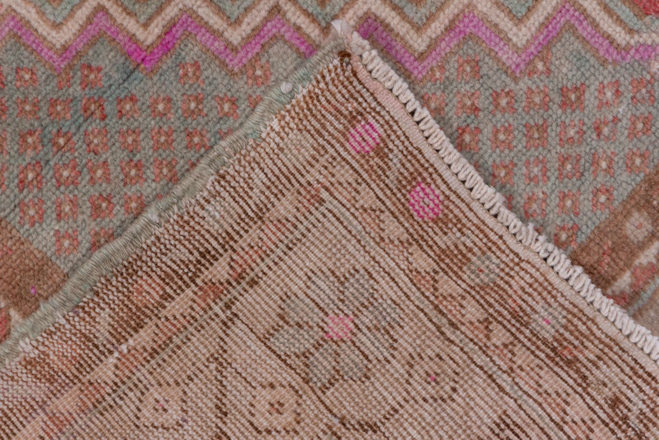 3' x 11' one-of-a-kind handmade antique Oushak runner rug. Color palette: rose, taupe, ivory, brown, dusty pink, sage