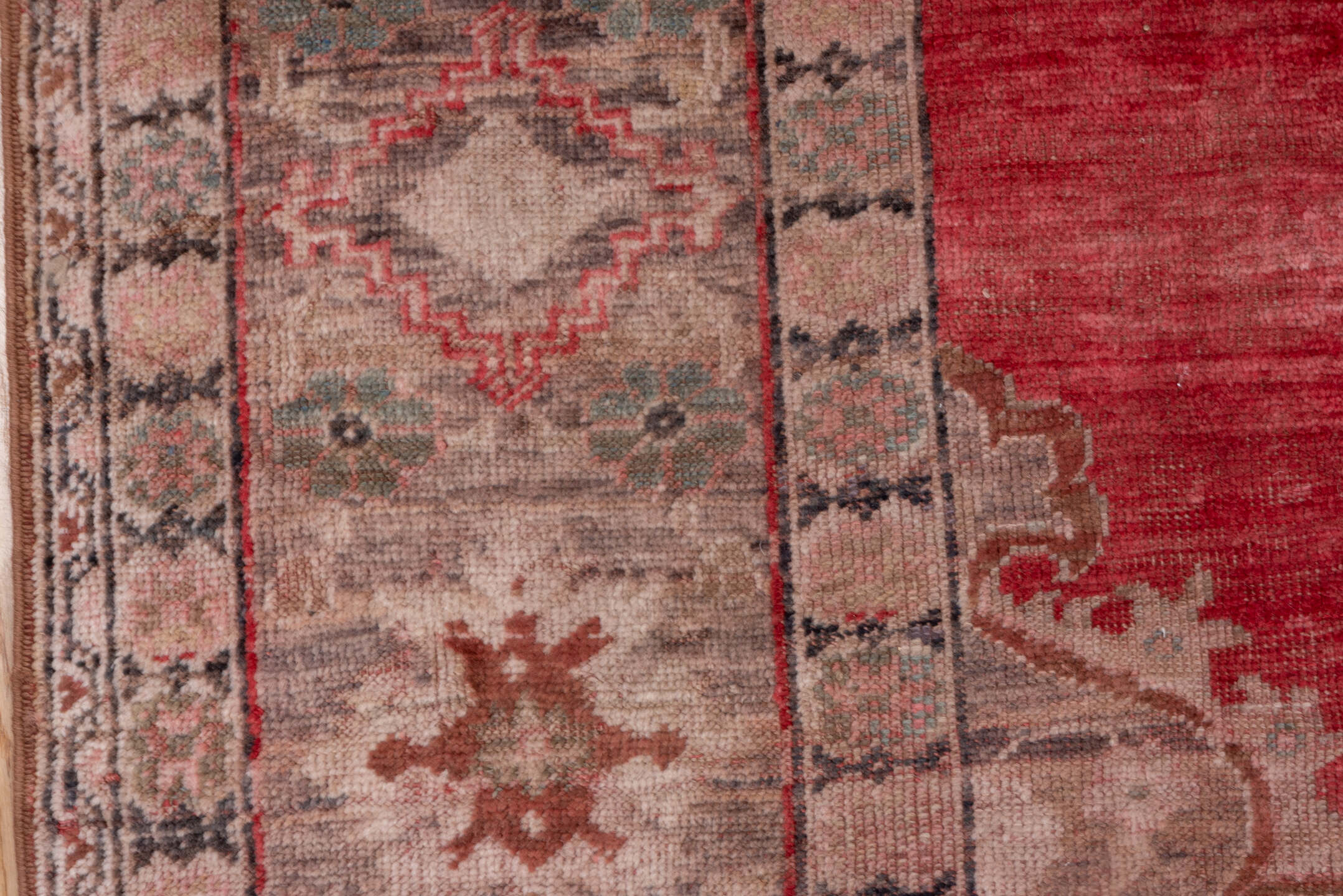 7' x 8' one-of-a-kind handmade antique Oushak rug. Color palette: coral, taupe, rose, ivory, sage, rust, charcoal