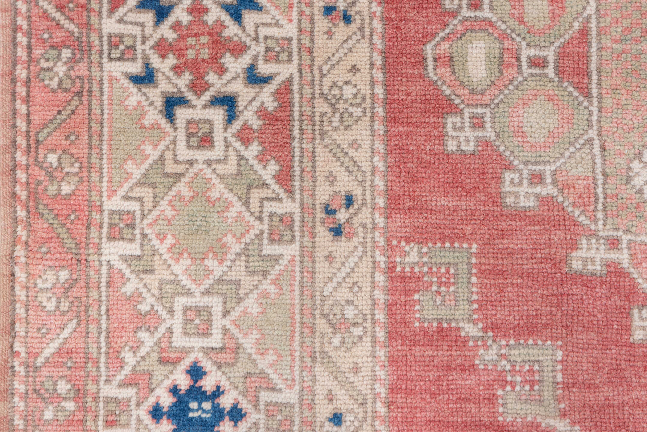 5' x 8' one-of-a-kind handmade vintage Oushak medium size rug. Color palette: coral, ivory, taupe, dusty rose, blue, sage