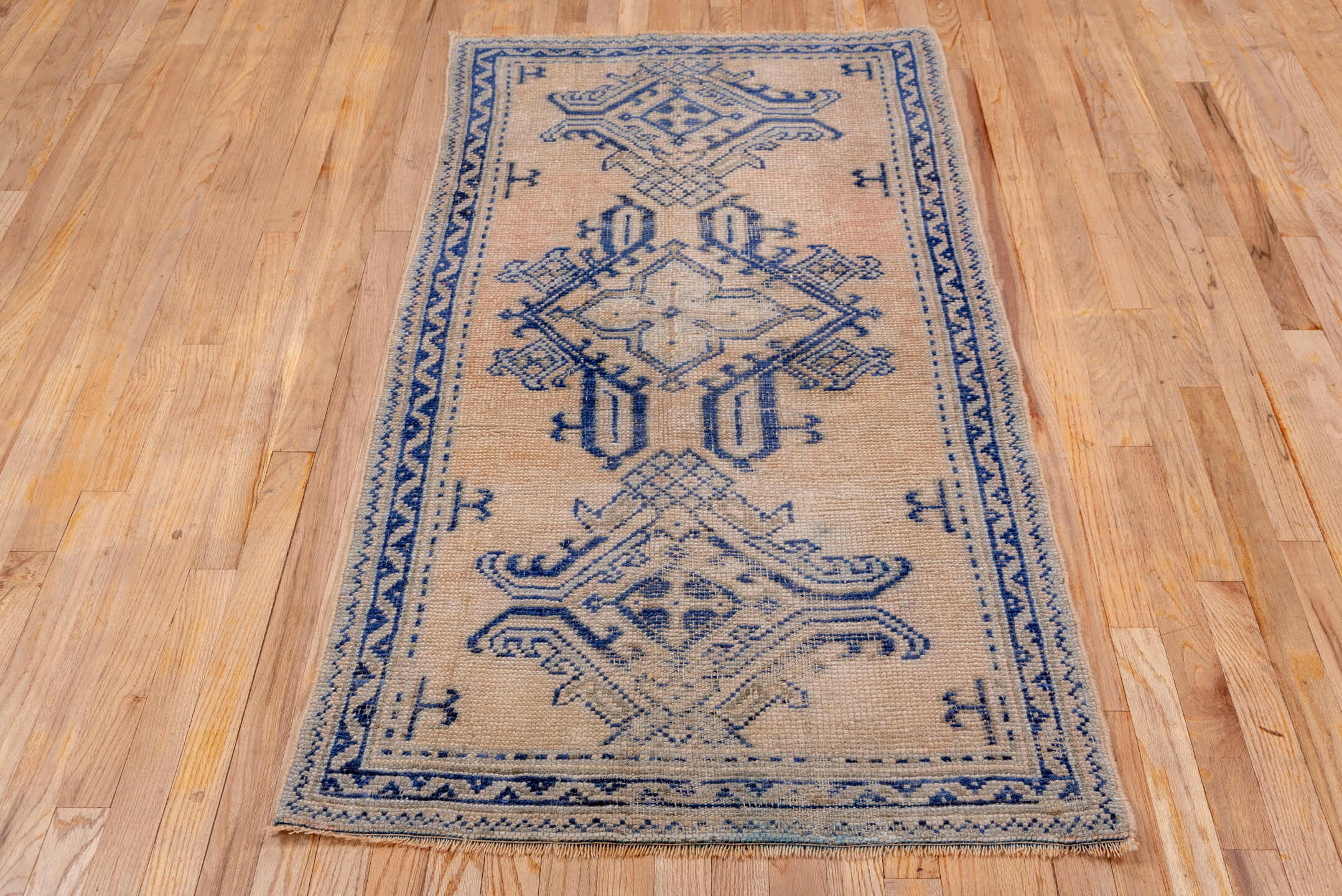 2' x 5' one-of-a-kind handmade vintage Oushak small size rug. Color palette: ivory, indigo, beige, camel, taupe, purple