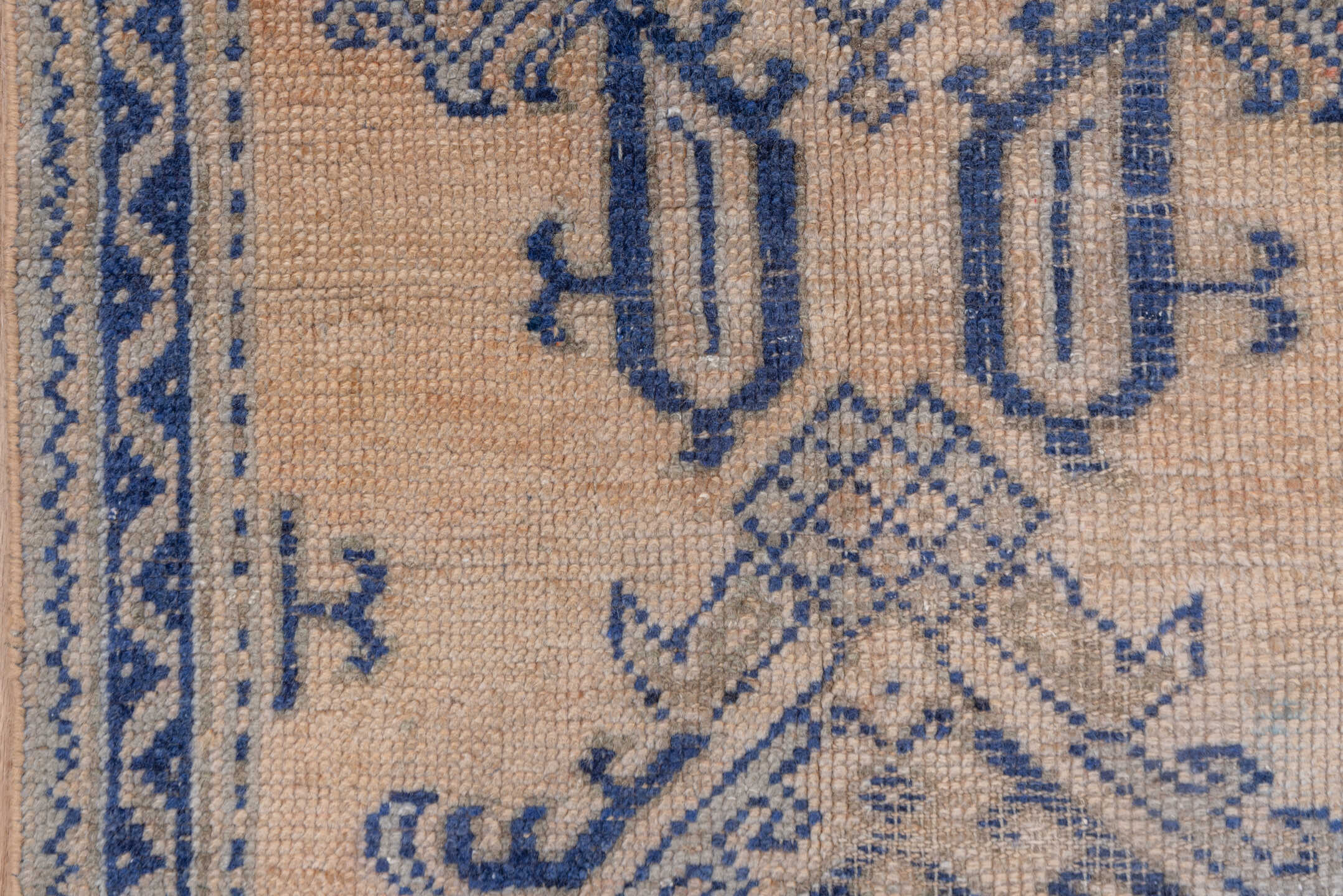 2' x 5' one-of-a-kind handmade vintage Oushak small size rug. Color palette: ivory, indigo, beige, camel, taupe, purple