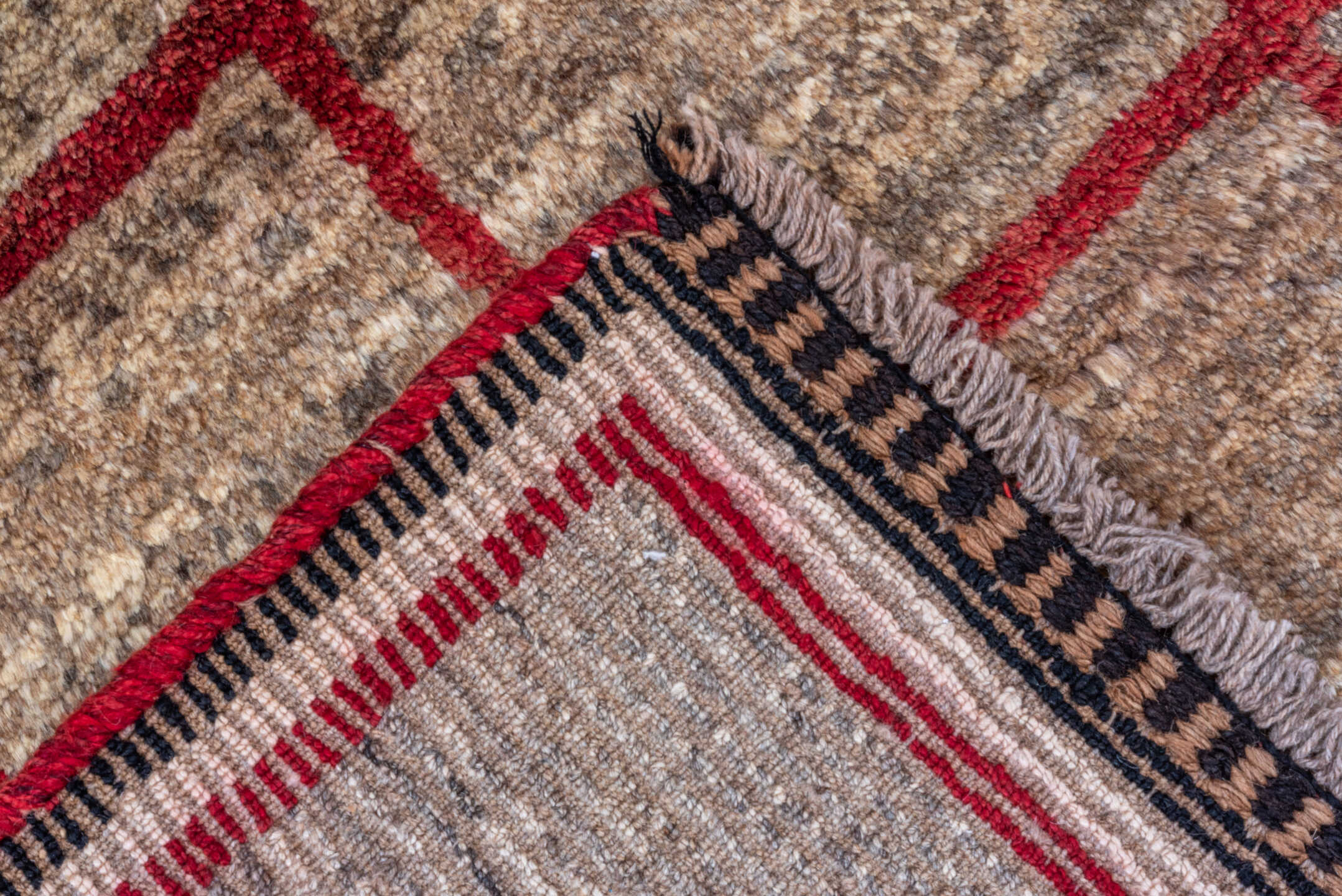 3' x 5' one-of-a-kind handmade vintage Gabbe small size rug. Color palette: brown, pink, red, tan