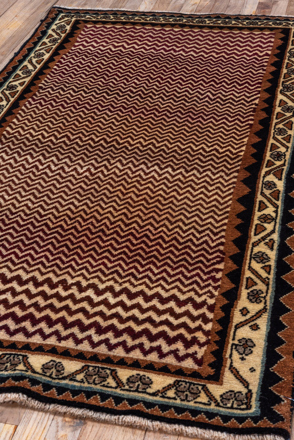 3' x 6' one-of-a-kind handmade vintage Gabbe small size rug. Color palette: black, brown, gray, off-white, orange, pink, red